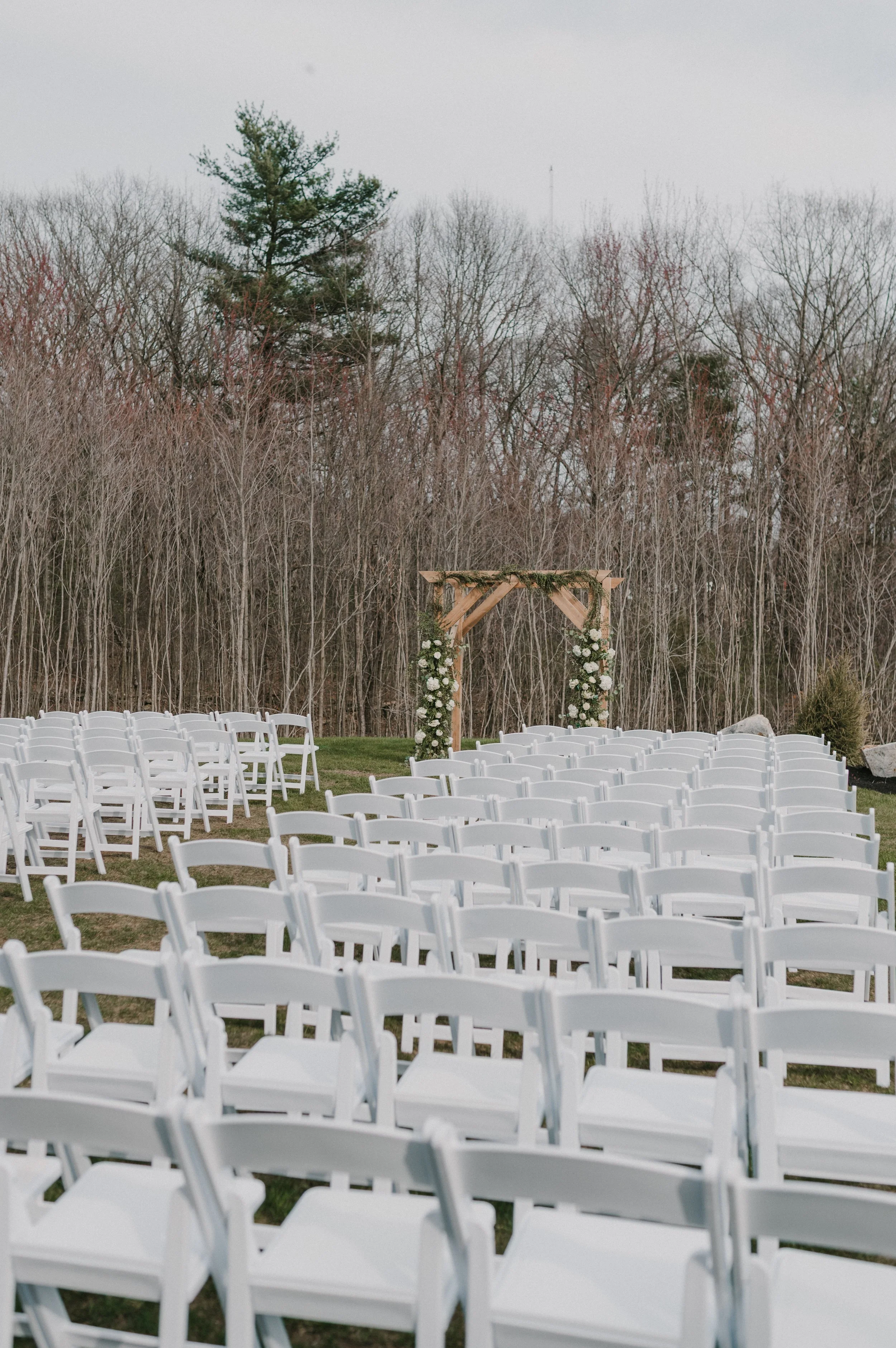 Pre-ceremony view of wedding on the Middle Lawn facing the back woods. 