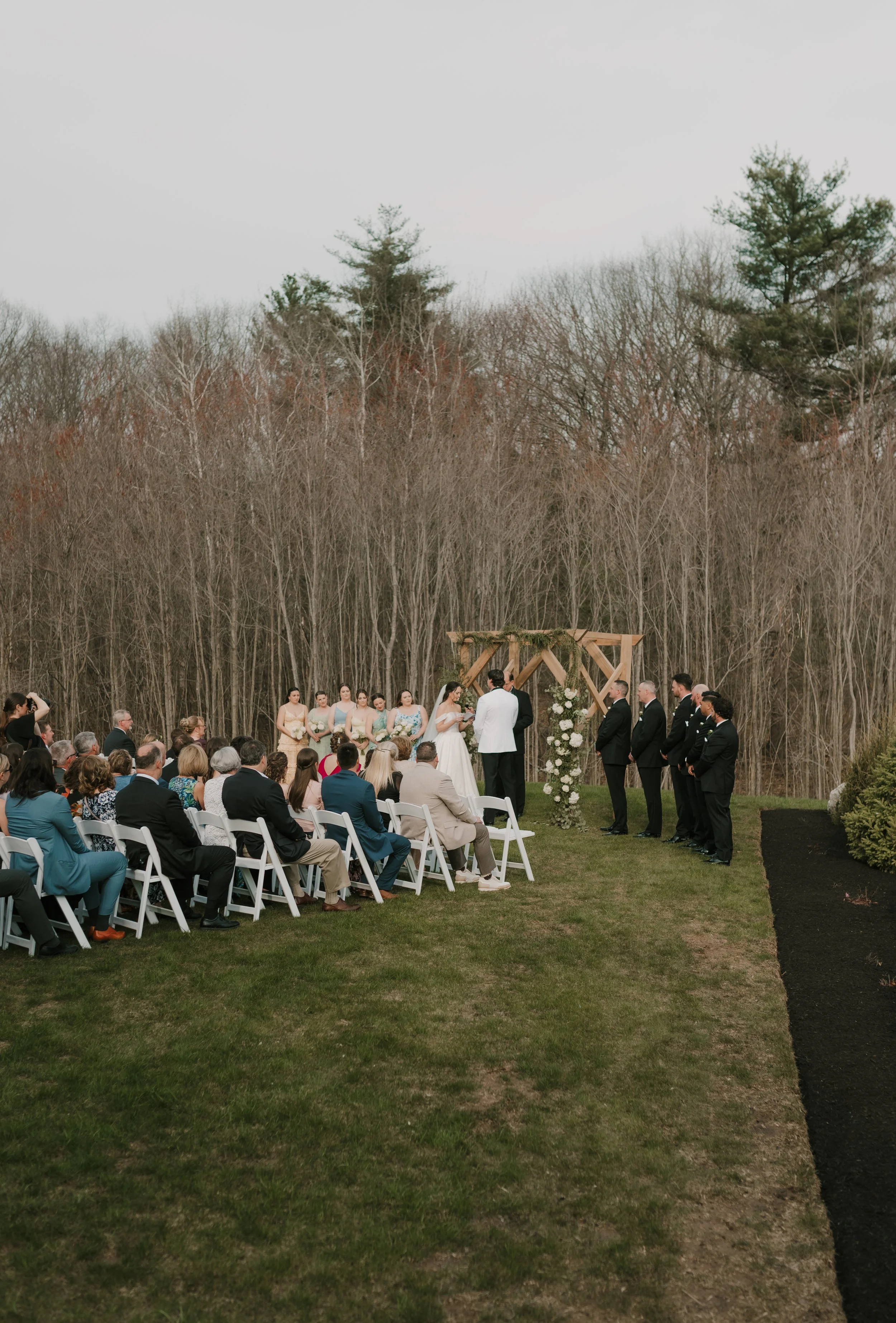 View of wedding ceremony on the Middle Lawn from the Roof Top Deck. 