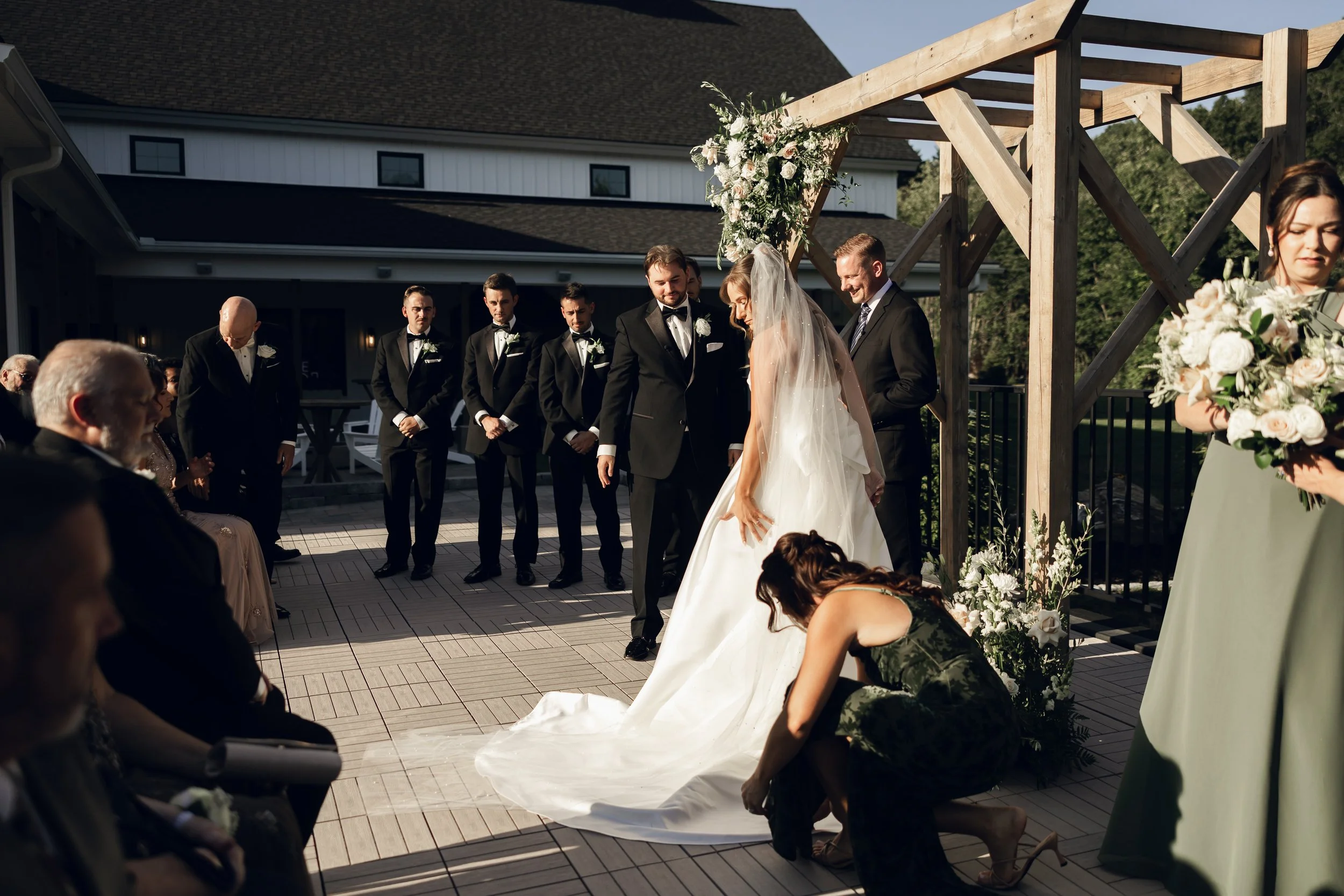 View of wedding ceremony from front right side guest seating on the Roof Top Deck.