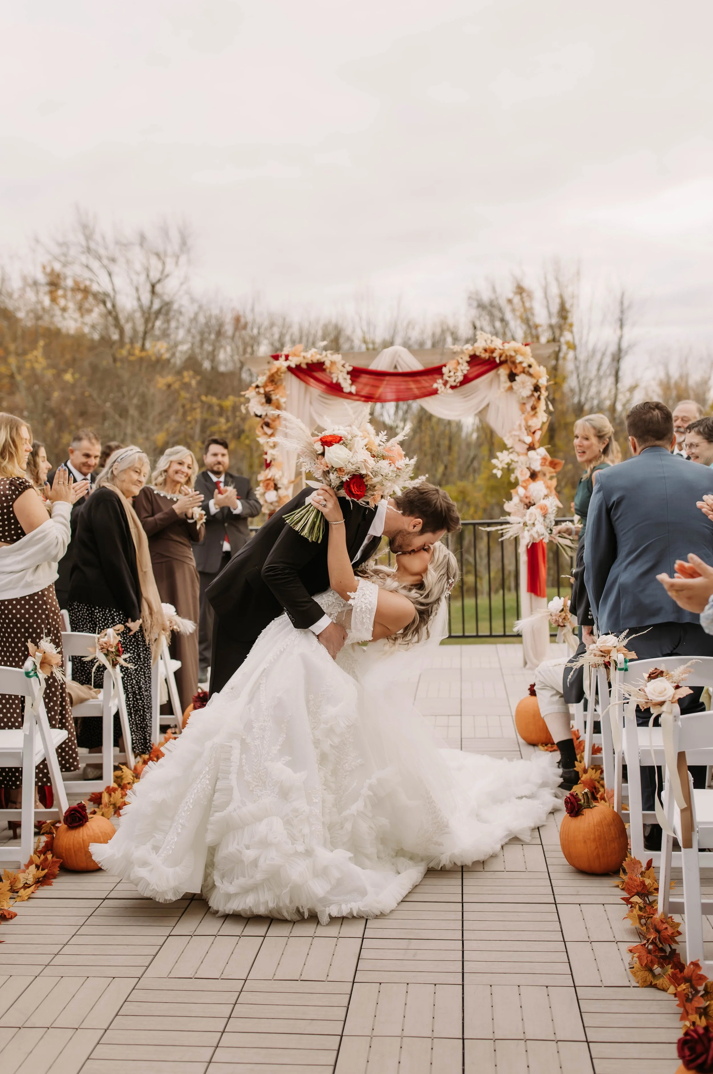 End of wedding ceremony located on Roof Top Deck facing the pond.