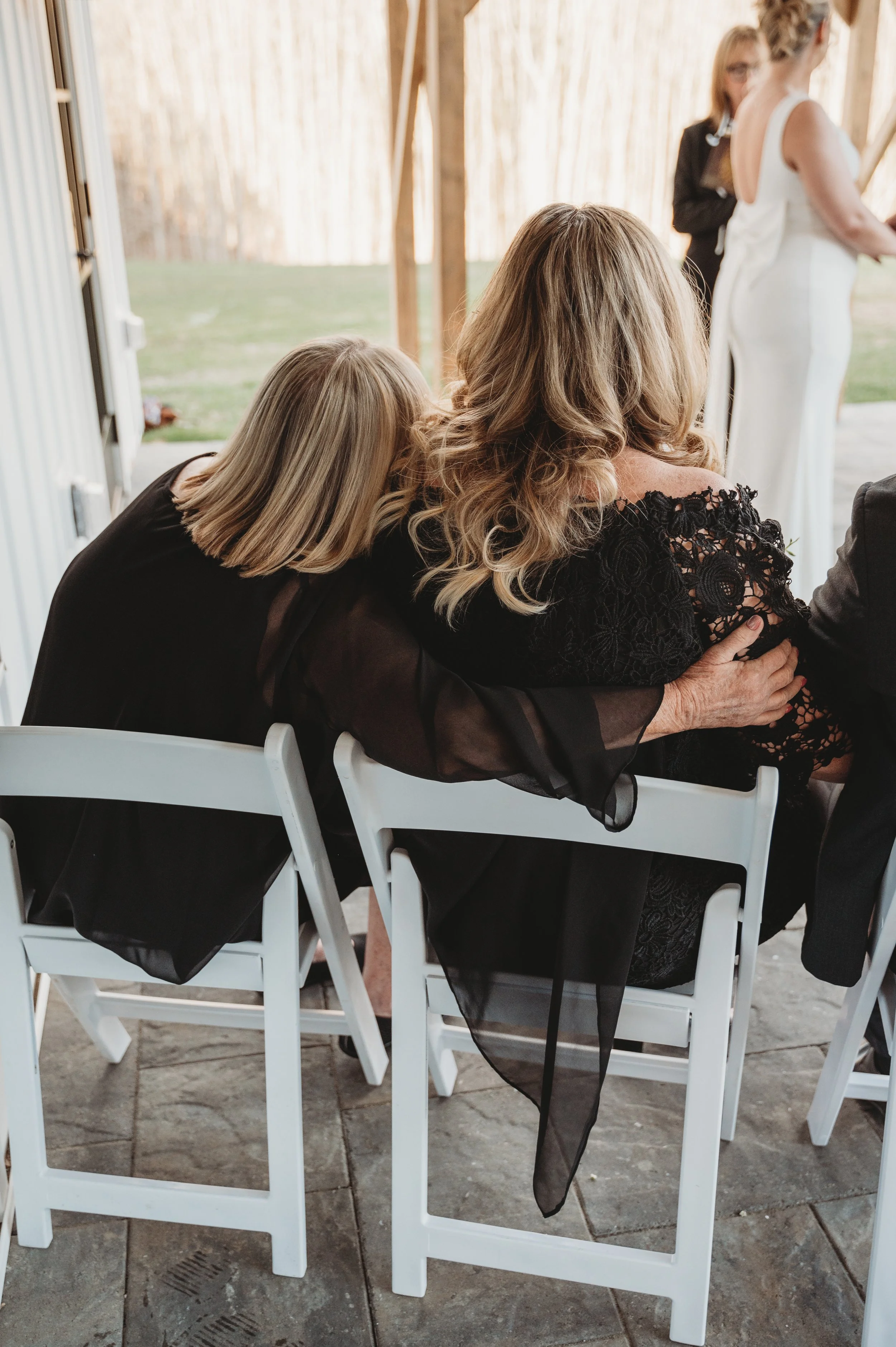 View of front guest seating under the Long Covered Porch during wedding ceremony. 