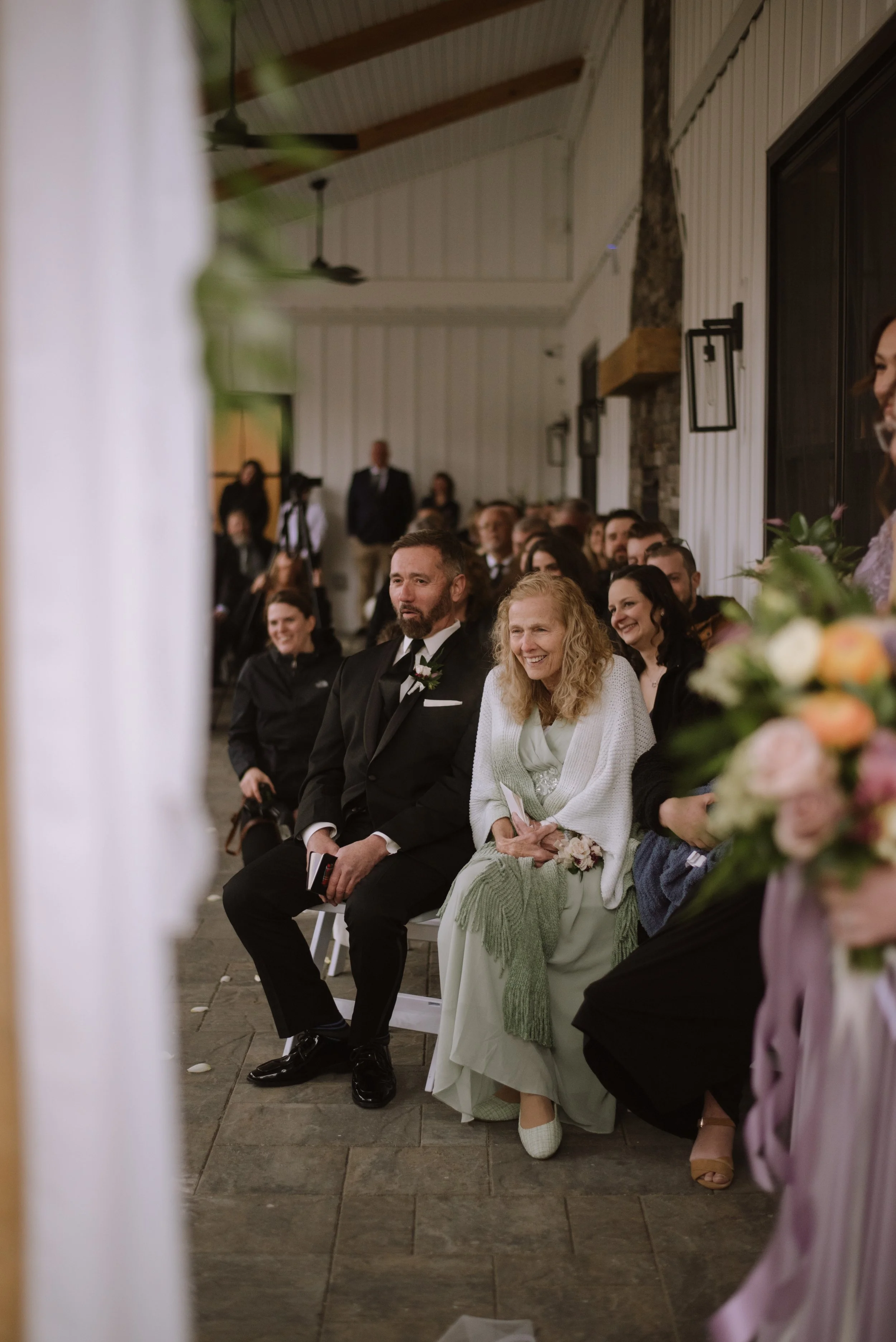 View of guests during ceremony under the Long Covered Porch.