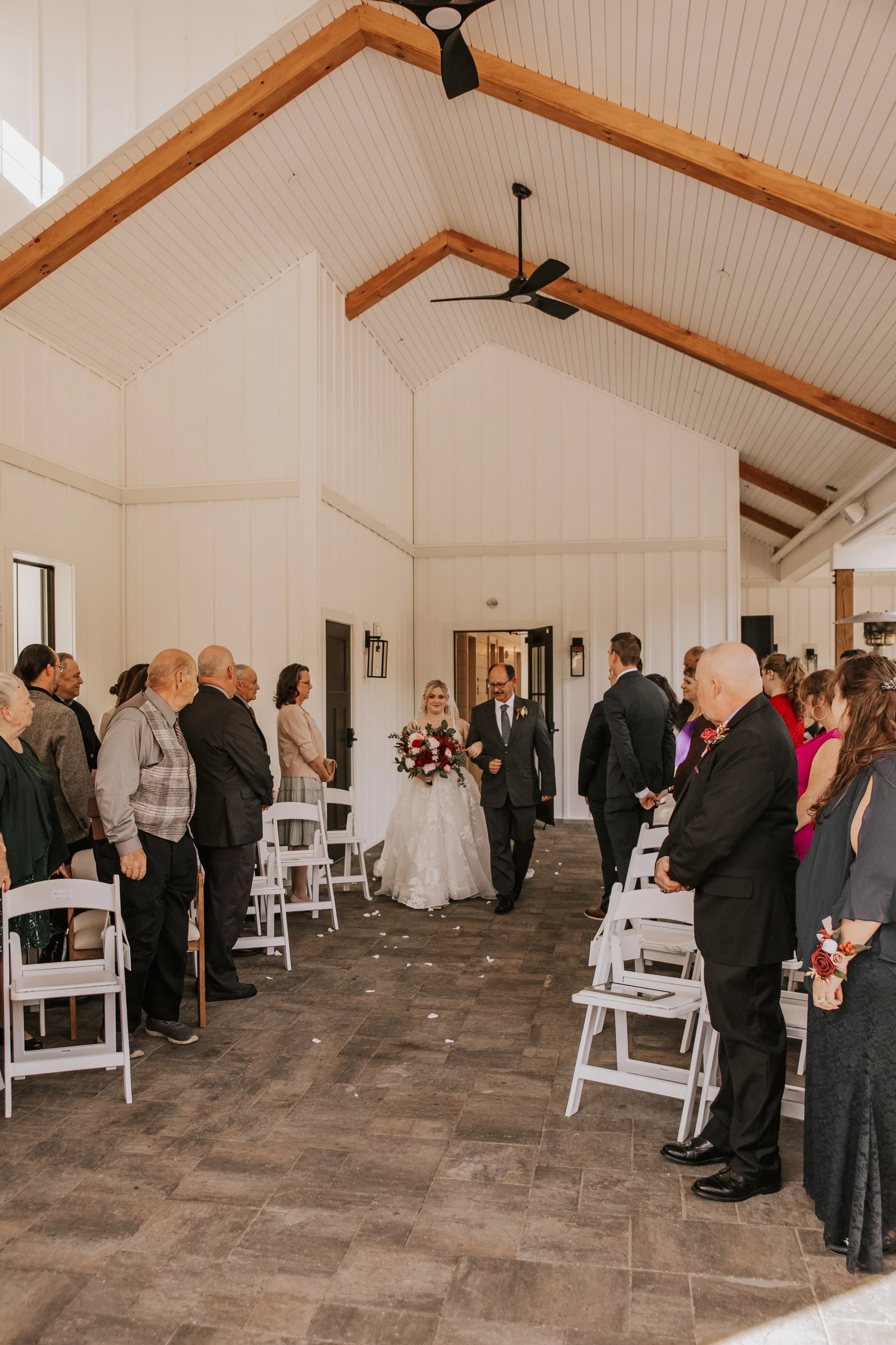 Processional down the aisle, entering from the breezeway door.
