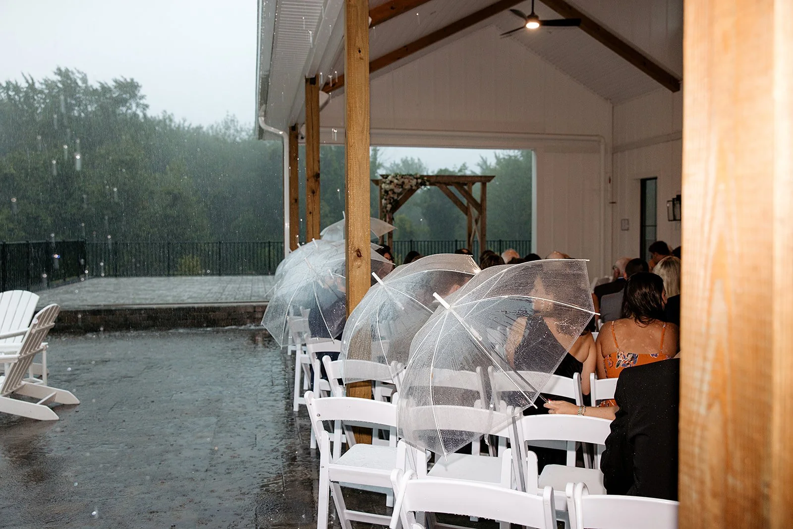 Wedding ceremony located under the Covered Breezeway with inclement weather. 