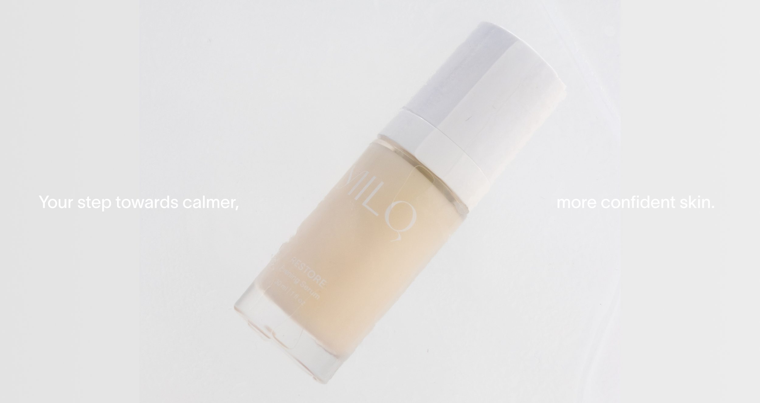 A bottle of skincare serum labeled 'restore' on a white background with the text 'Your step towards calmer, more confident skin.'