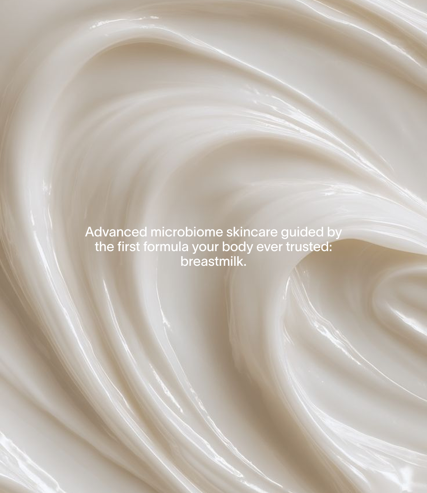 Close-up of swirled, creamy breastmilk with a smooth, glossy texture.