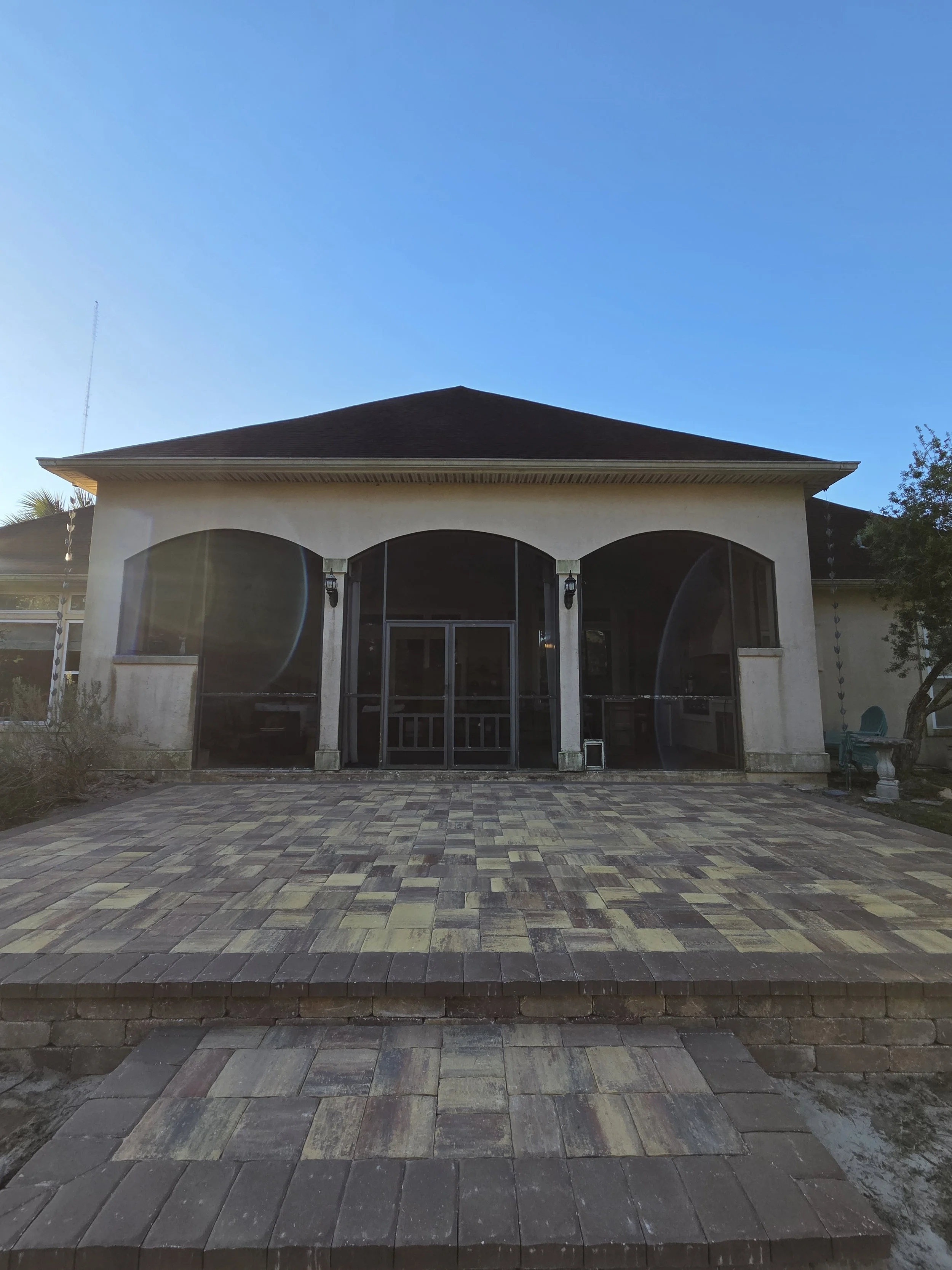 autumn blend tremron pavers patio deck elevated border with a step