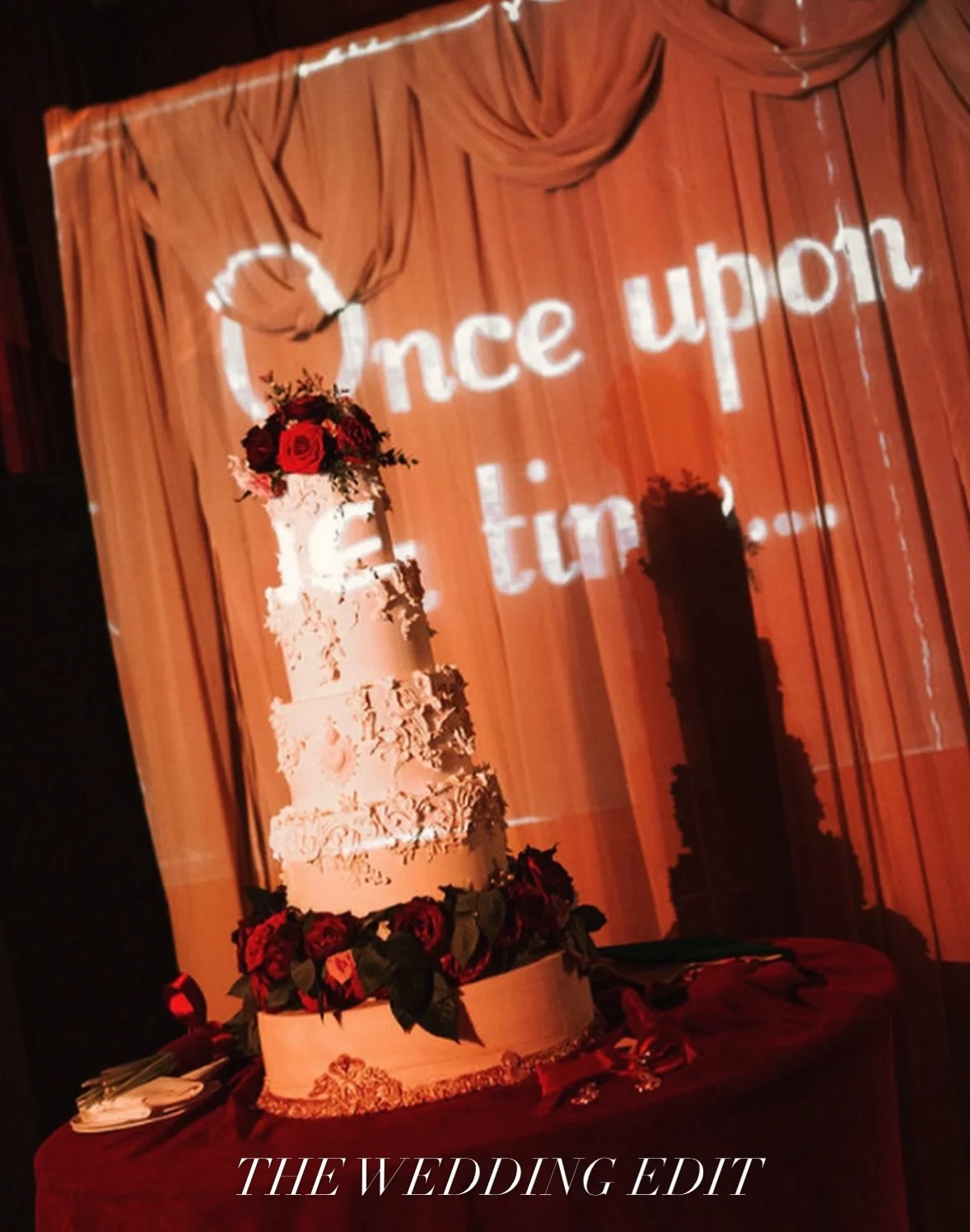 THE WEDDING EDIT.  Cliveden House

Five tiers of hand-sculpted sugar relief and fresh red roses.

An exercise in balance &mdash;
ornament and restraint,
structure and softness.

Designed to belong within the space,
not simply sit within.
 Creative Te