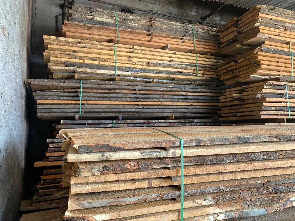 Live edge slabs undergoing kiln drying to ensure optimal moisture content and stability