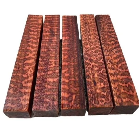 Set of five premium Snakewood pen blanks, showcasing their intricate patterns and rich brown color