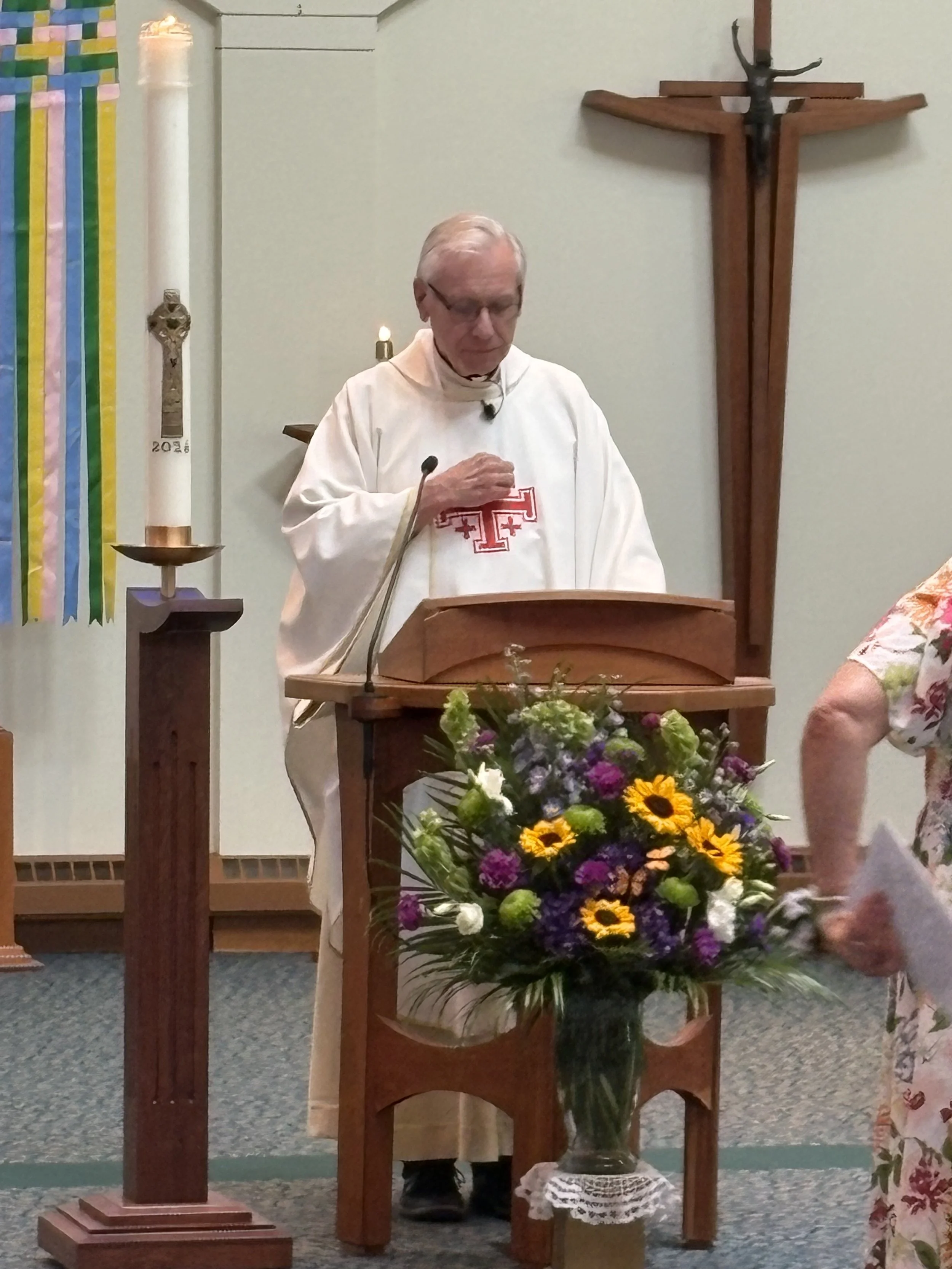 Father Bob Kennedy serving as Presider