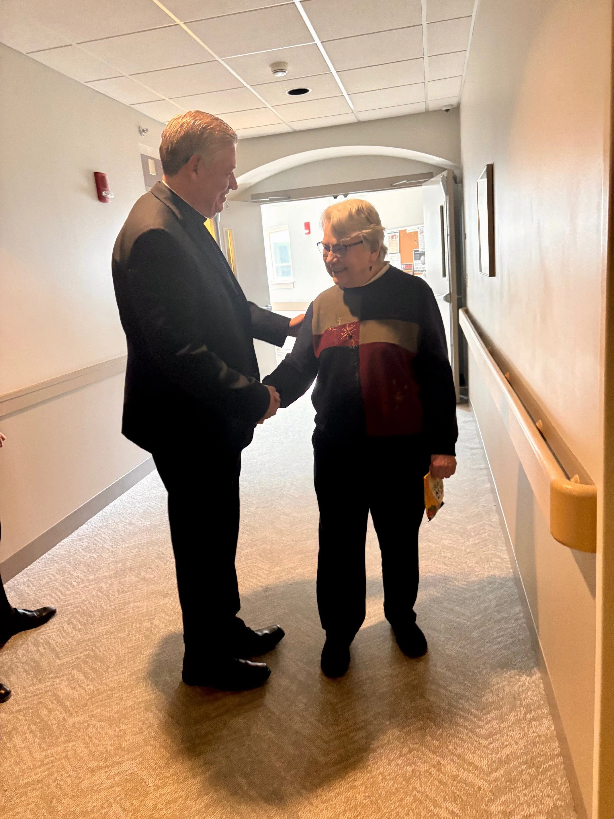 Eileen with Bishop.jpg