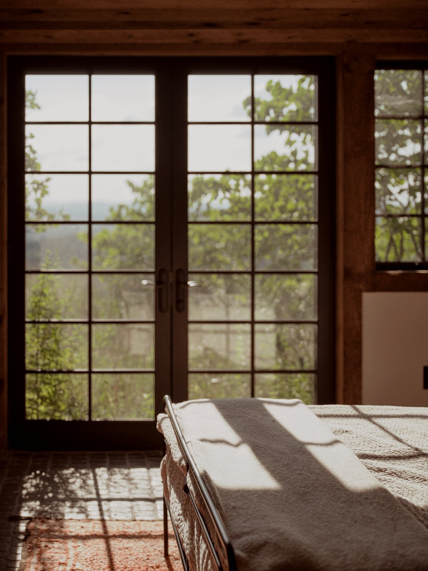 Bed beside the window