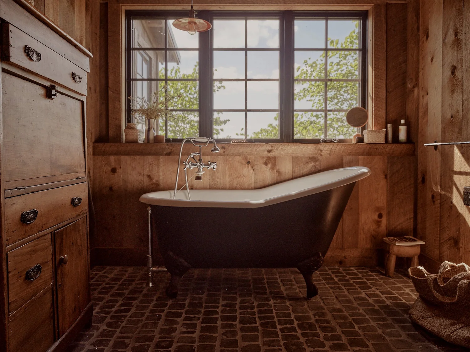 The soaking tub set on cobblestone