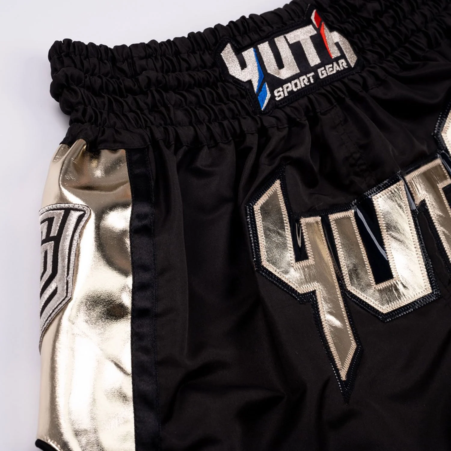 yhmts-001-yuth-muaythai-shorts-black-gold-2.jpg