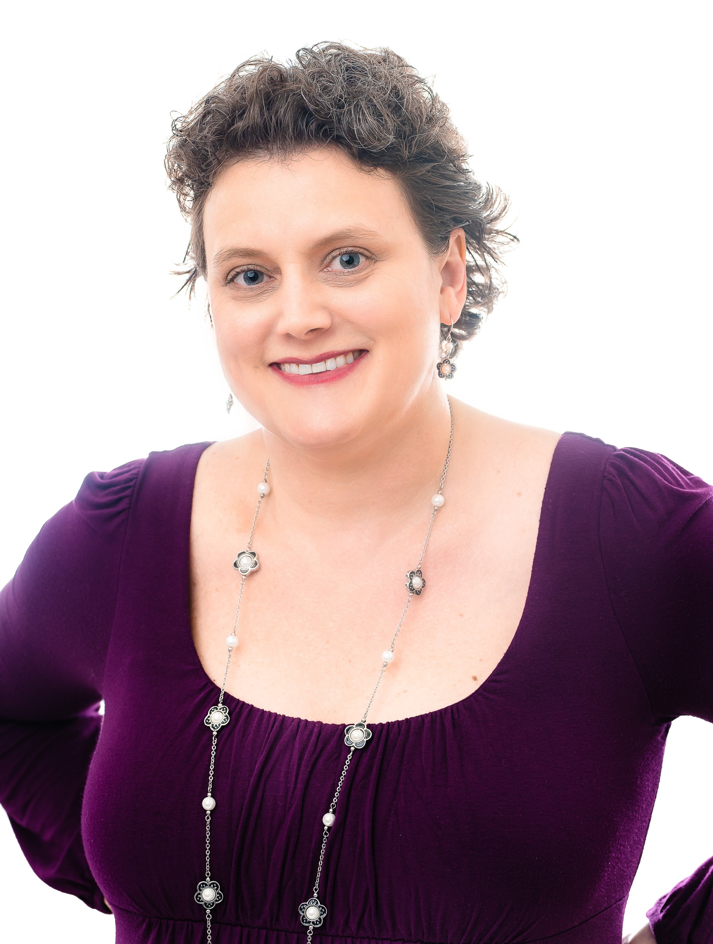 Julie Willson, a white woman with short brown hair.