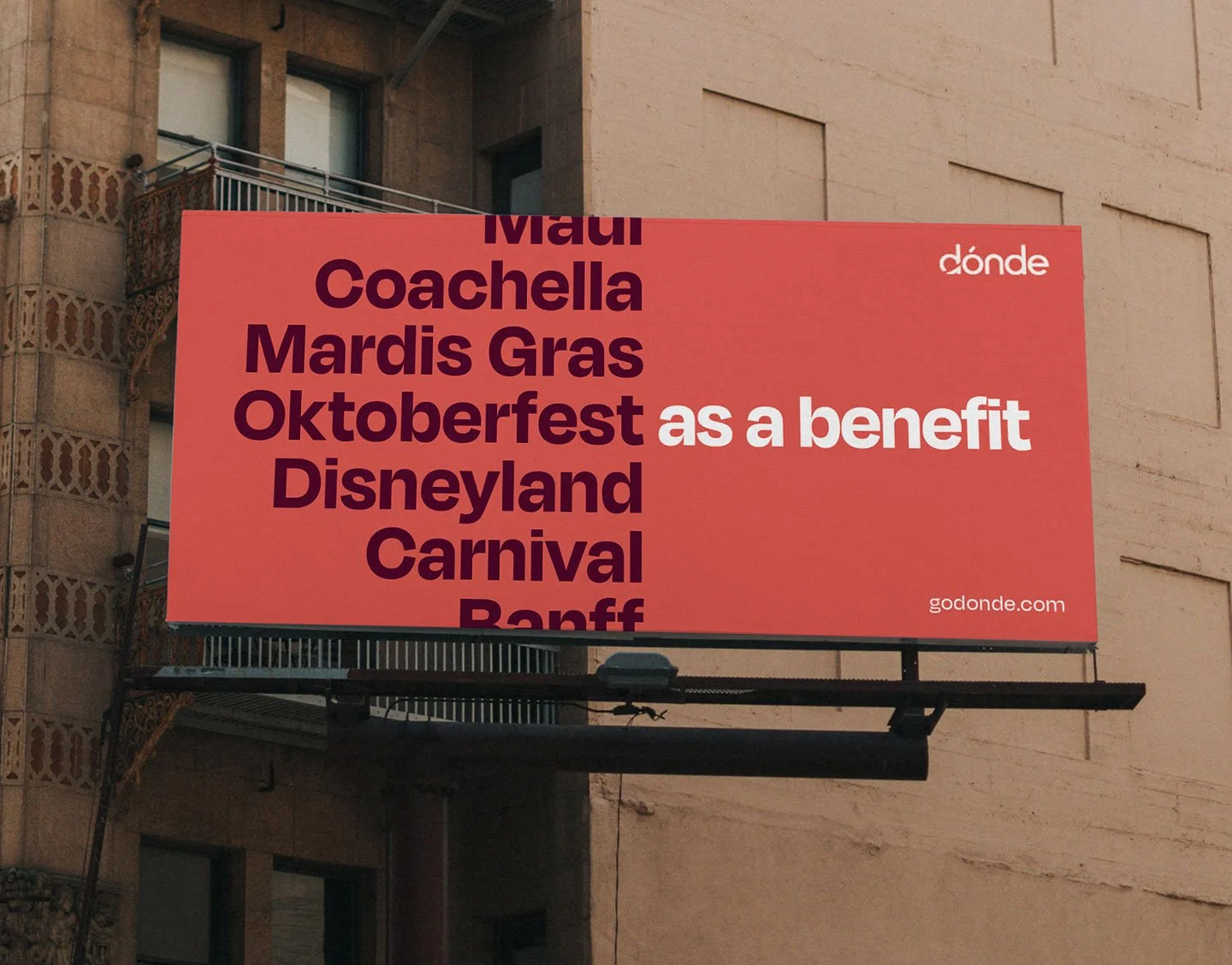 Billboard advertising various events and benefits including Mardi Gras, Oktoberfest, Disneyland, Carnival, Banff, and others, with the website godonde.com.