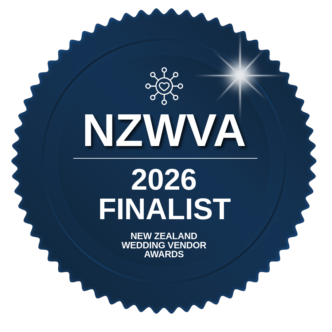 Blue award badge with white text and a sparkle effect, indicating finalist status in the 2026 New Zealand Wedding Vendor Awards (NZWVA).