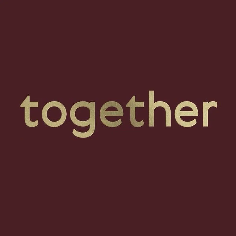 The word 'together' on a dark background.