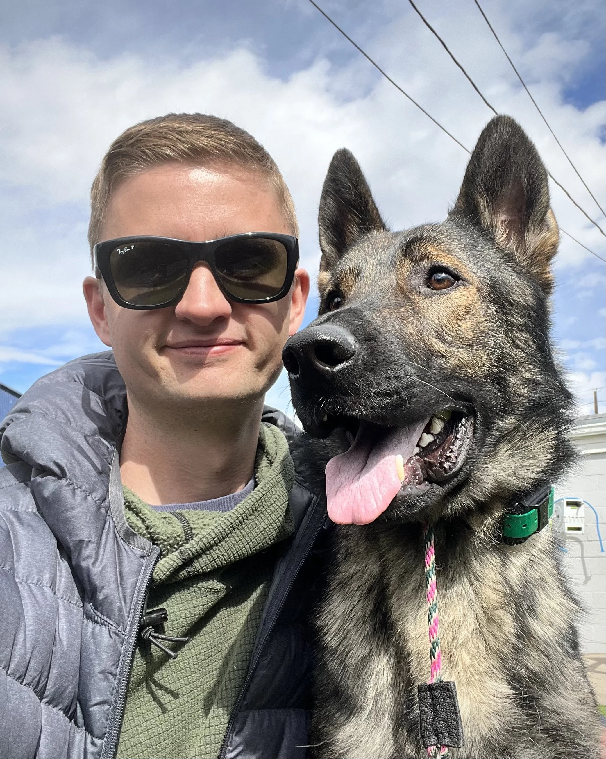 selfie of man with german shepherd