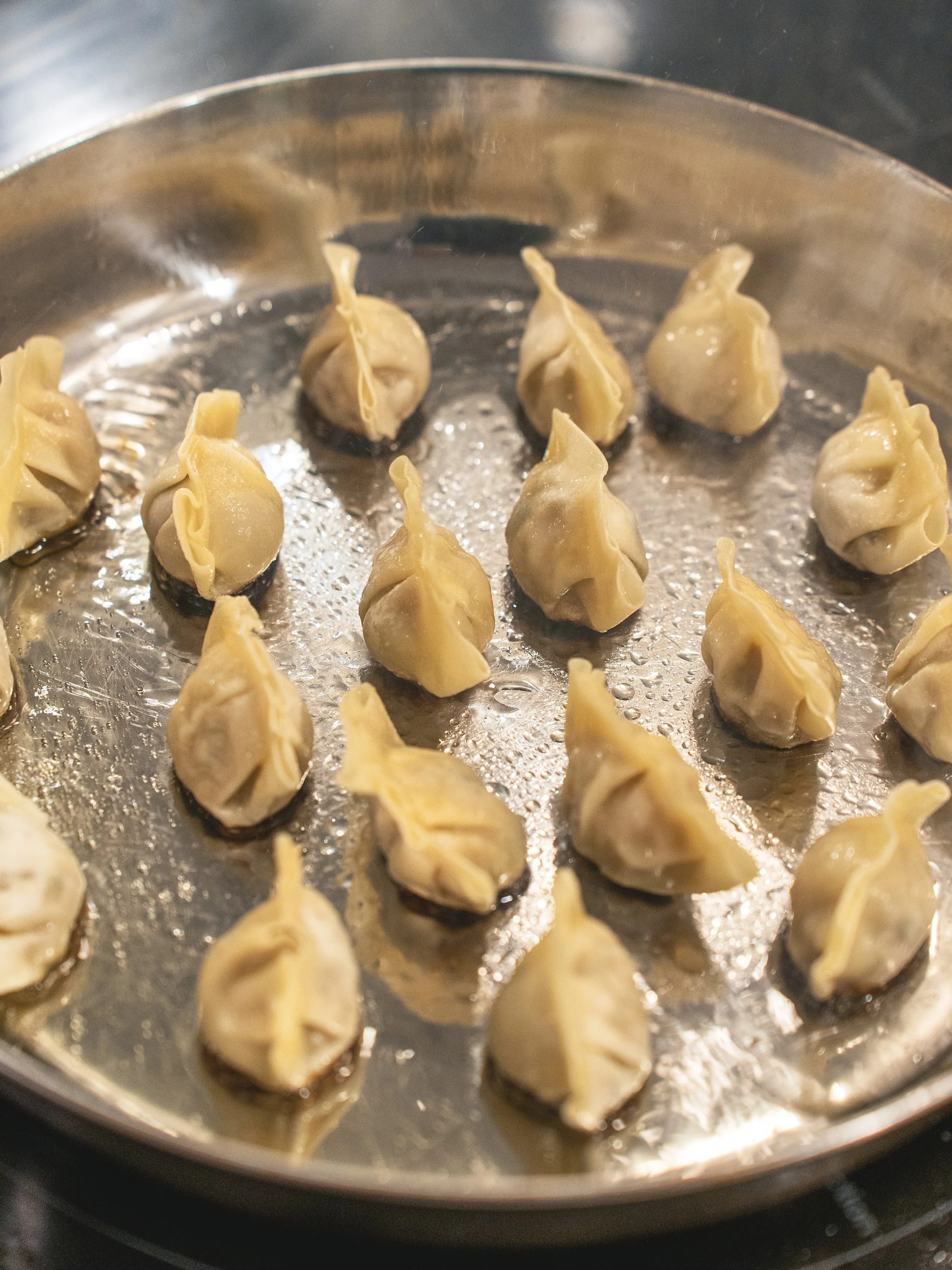 Gyozas searing.jpg