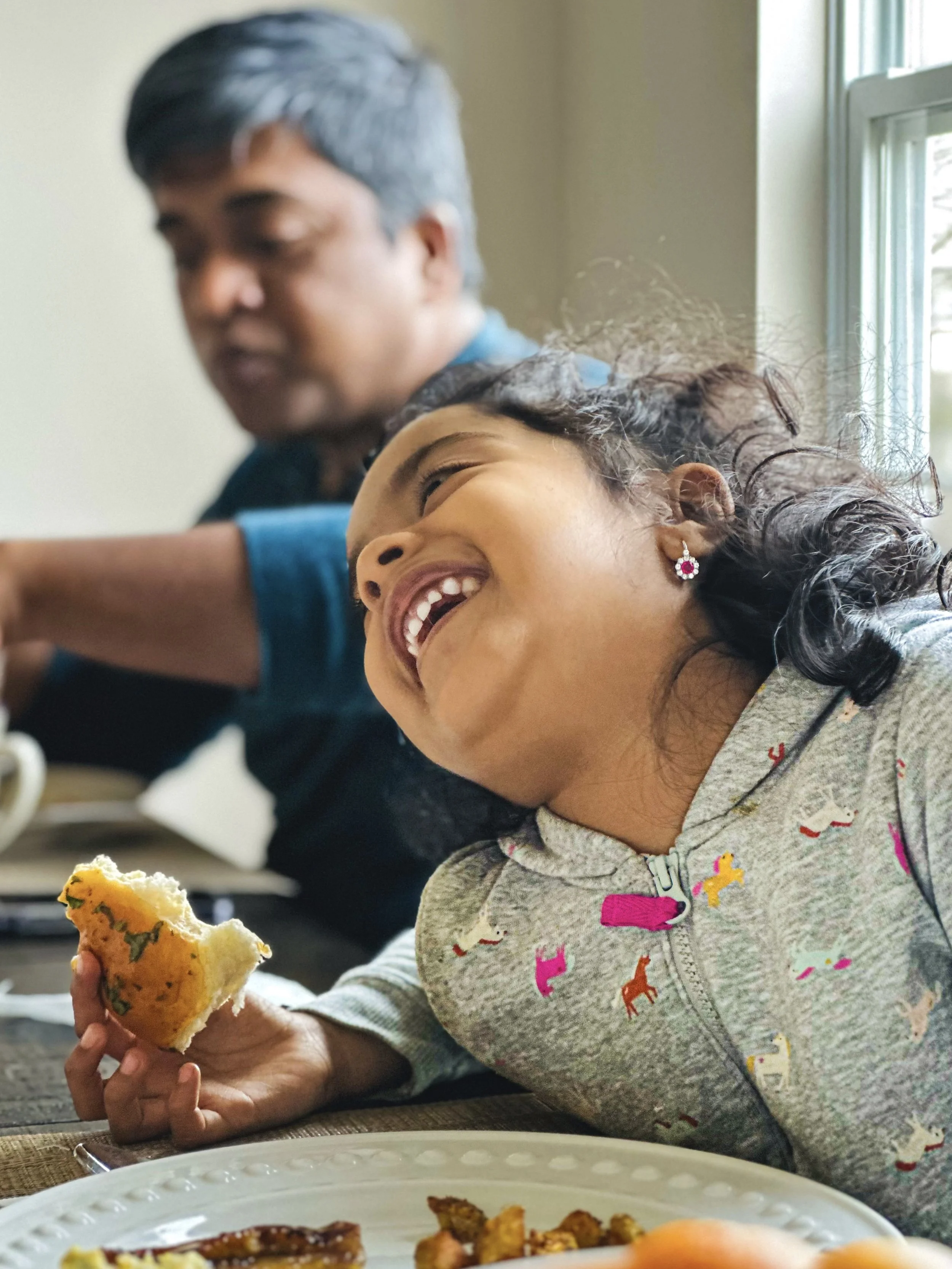 Kid having fun at breakfast .jpg