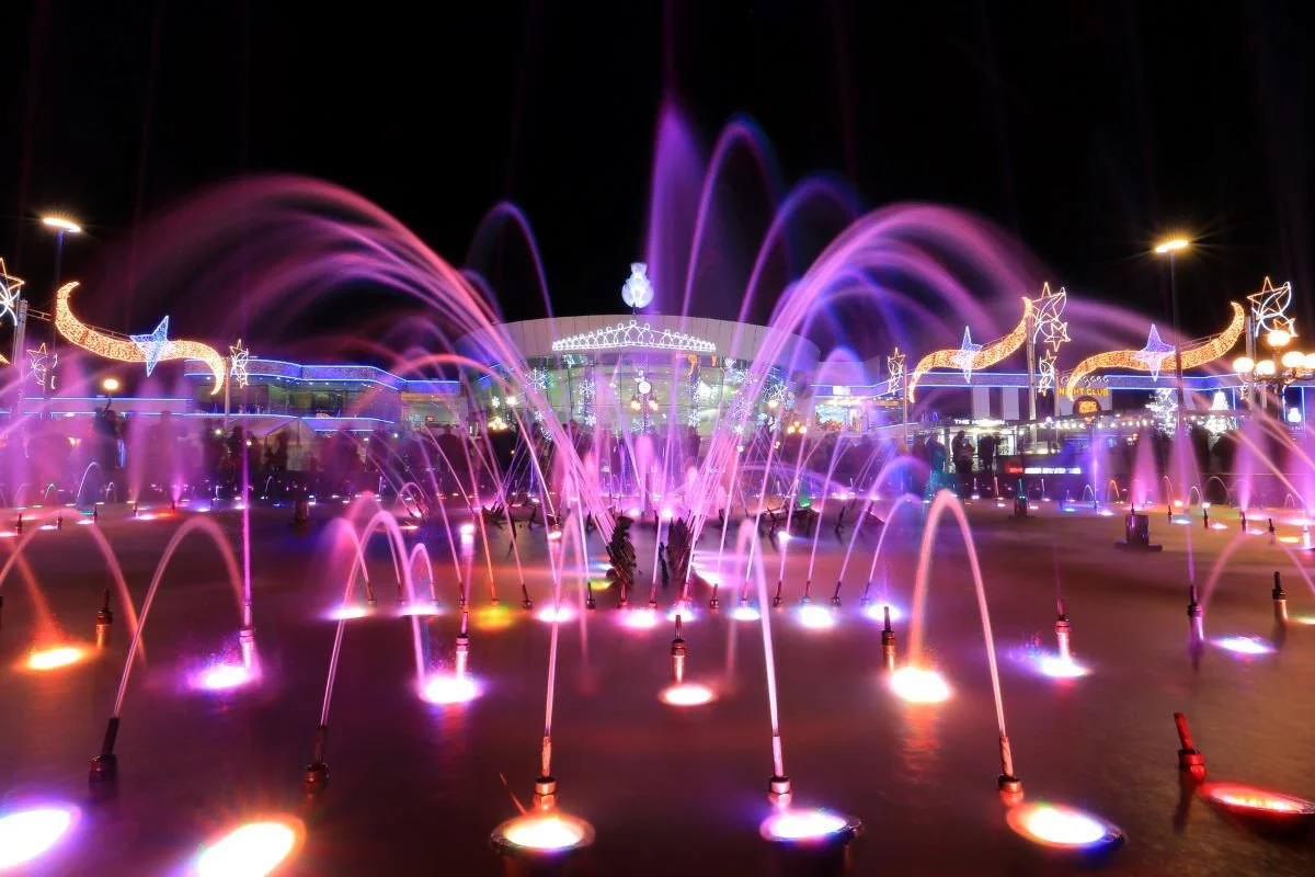 water fountains in Soho Sharm El Sheikh with pink lighting