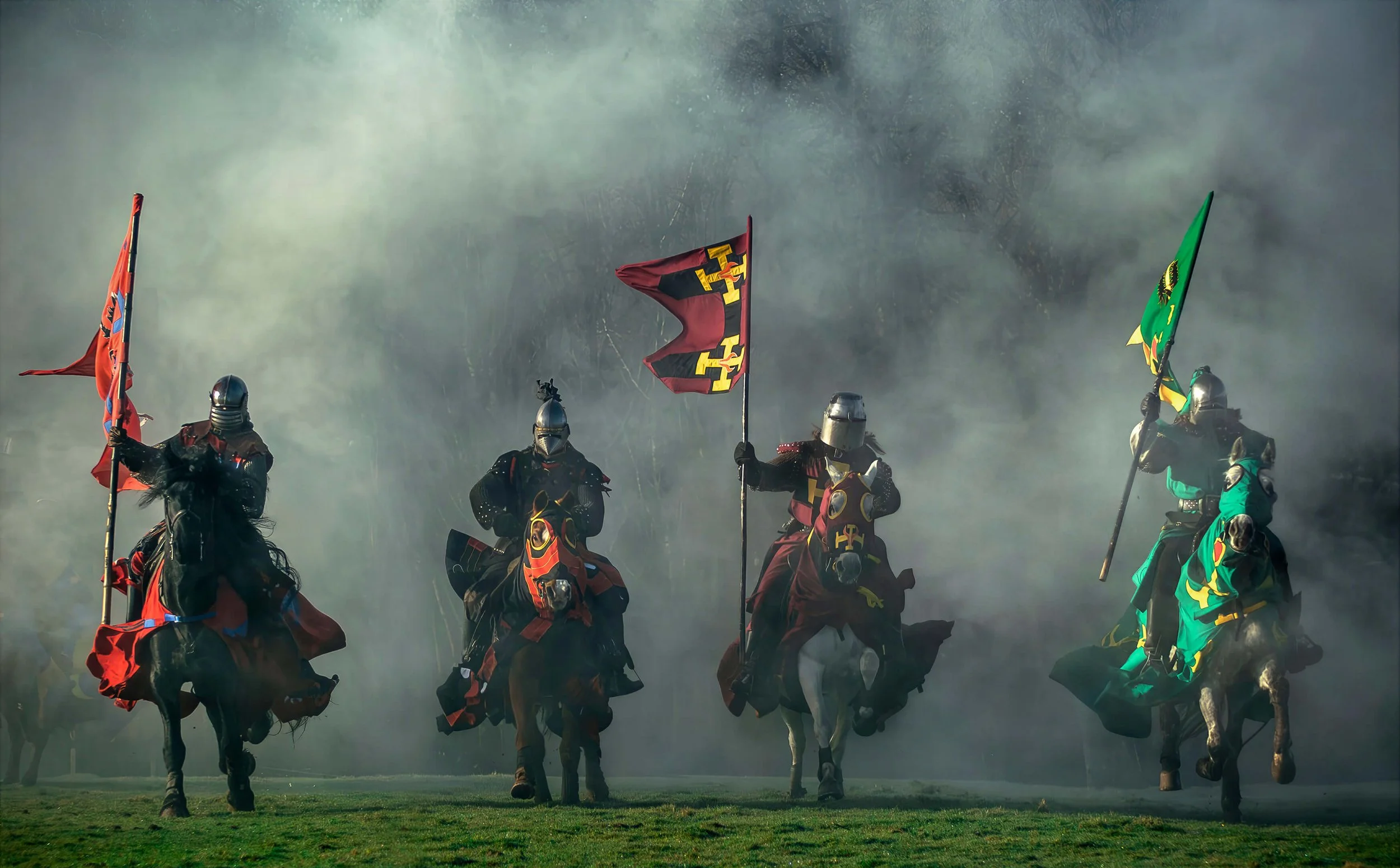medieval knights riding on horseback
