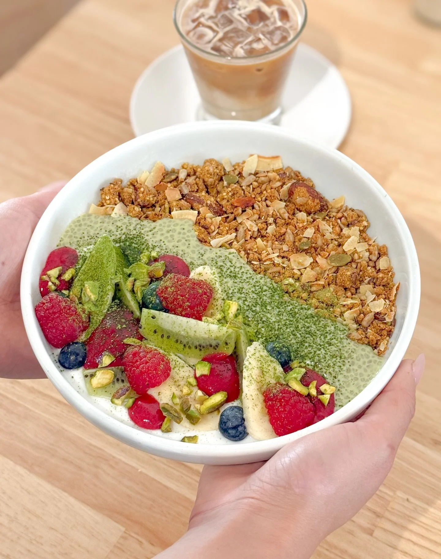 Granola + pistachio + coconut yogurt + berries.
You&rsquo;re welcome. 🤤 (Limited time only!)