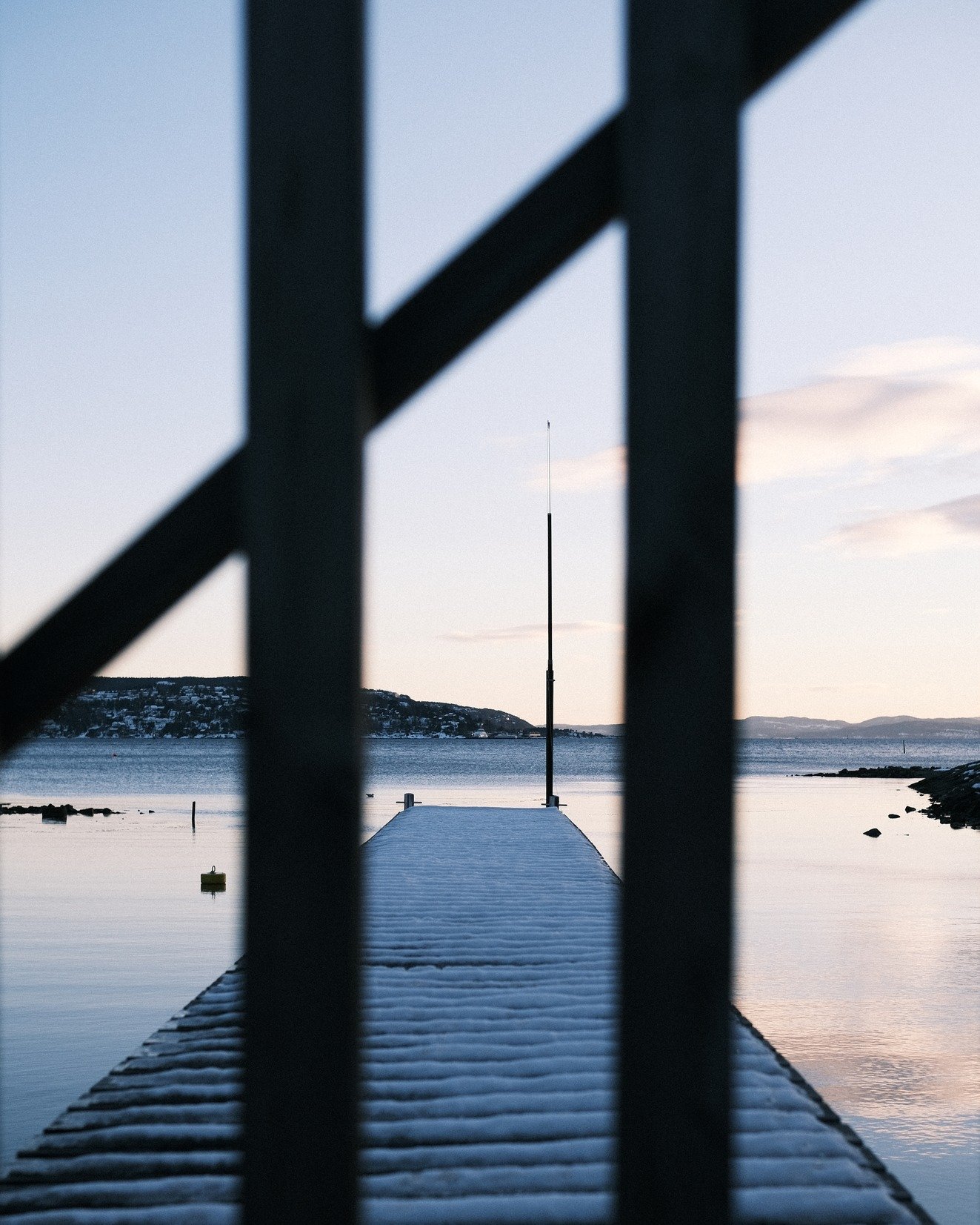 Frosty Pathway
A frost-covered pier leads to a solitary mast, a silent guidepost standing tall amidst the stillness of a winter's morning.
📷 Fujifilm X-T30 II
__
#WinterScenery #FrostyMorning #PierPhotography #CalmWaters #WinterHarbor #ChilledNature