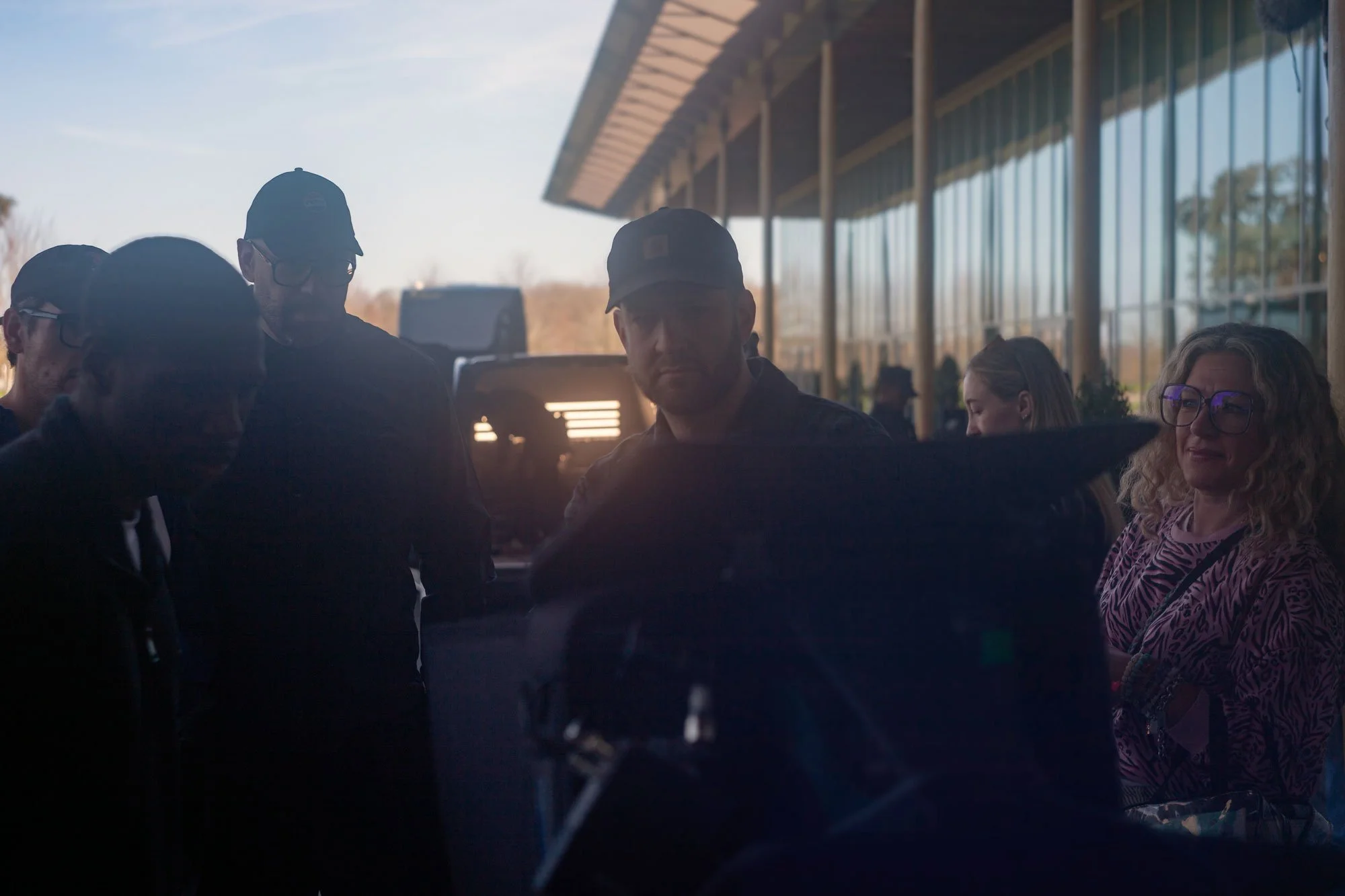 Director monitoring playback during Pepsi Max football commercial shoot