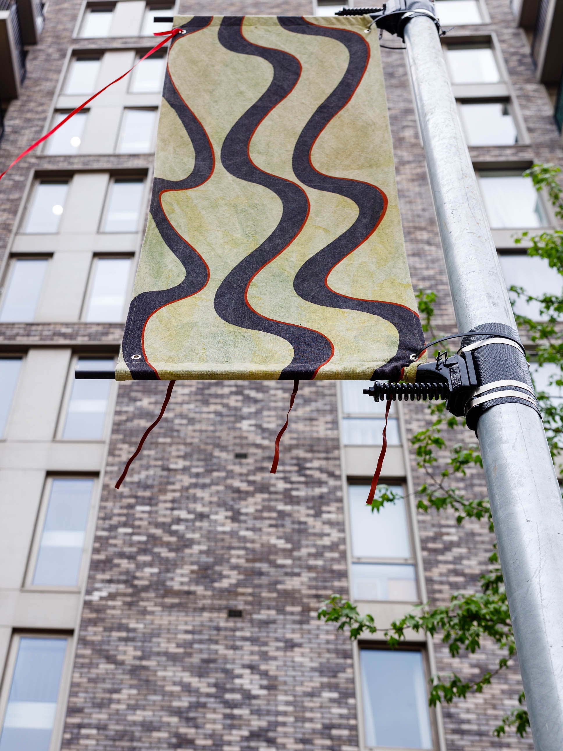 Desire Paths Banner, hemp cloth dyed with red onion skins, oak gall and ferrous sulphate. Ribbons hand-painted with pigment and beeswax. 