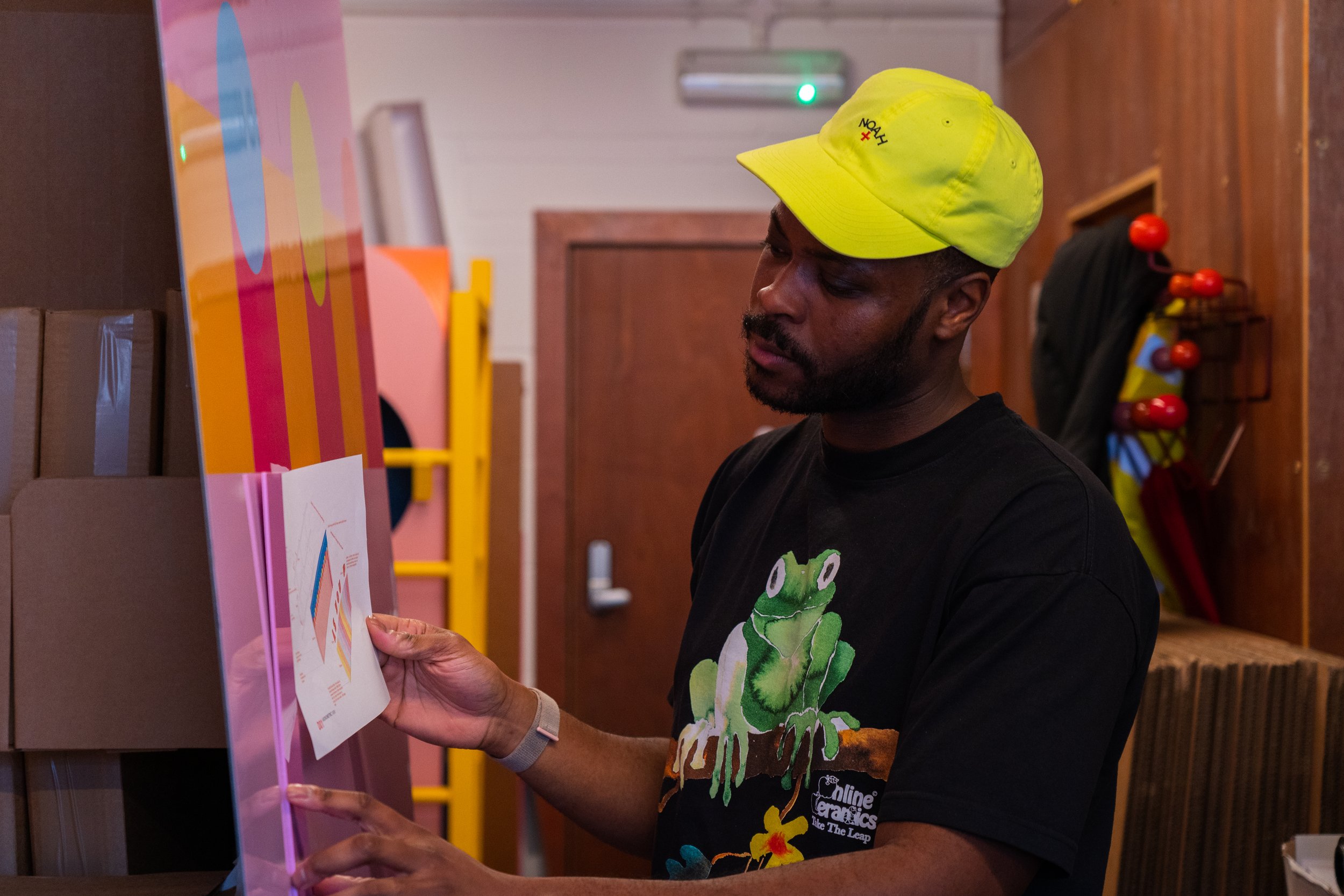  Artist in Residence Yinka Ilori MBE reviewing samples