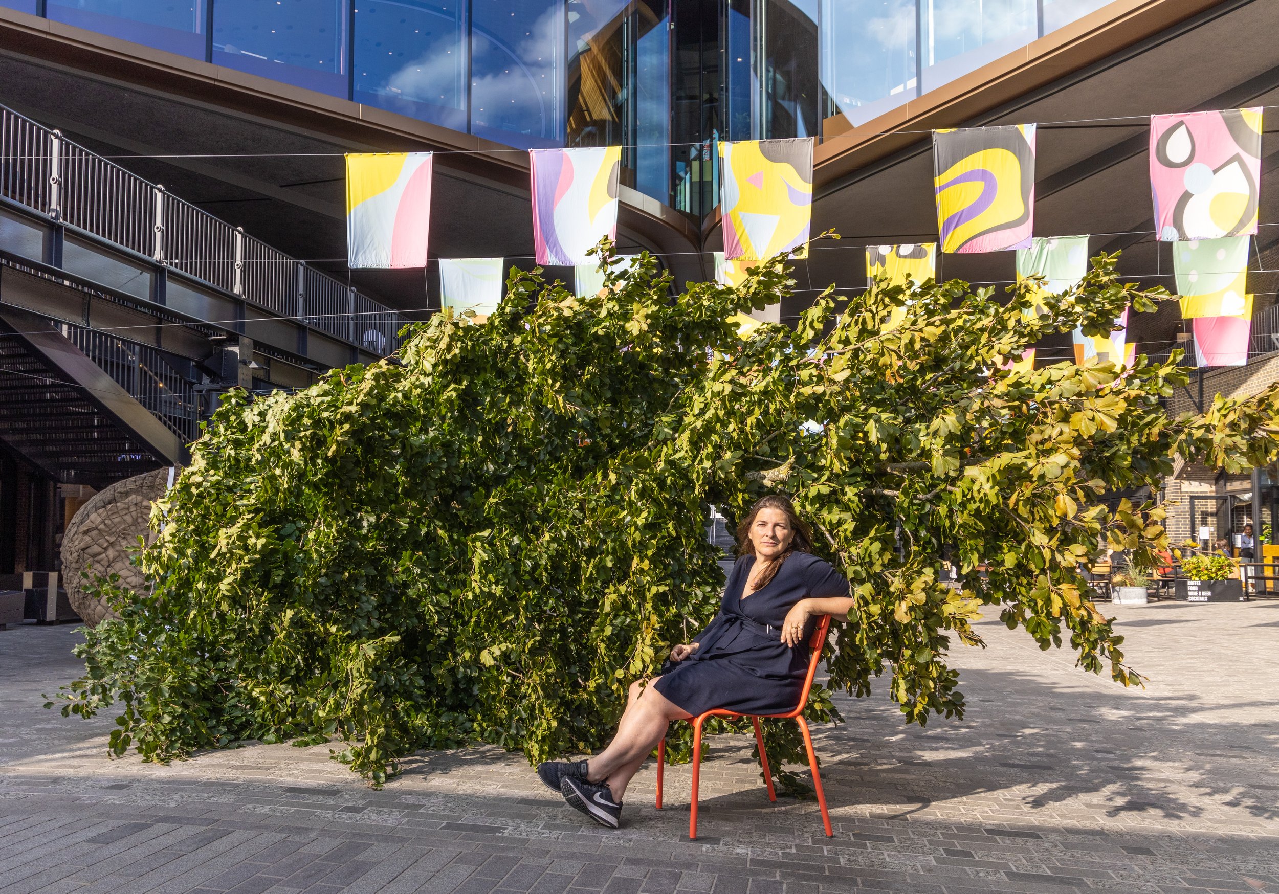 Liza Fior from mud architecture/art sits in front of a 34-year young Fagus Sylvatica, aka the Common Beech