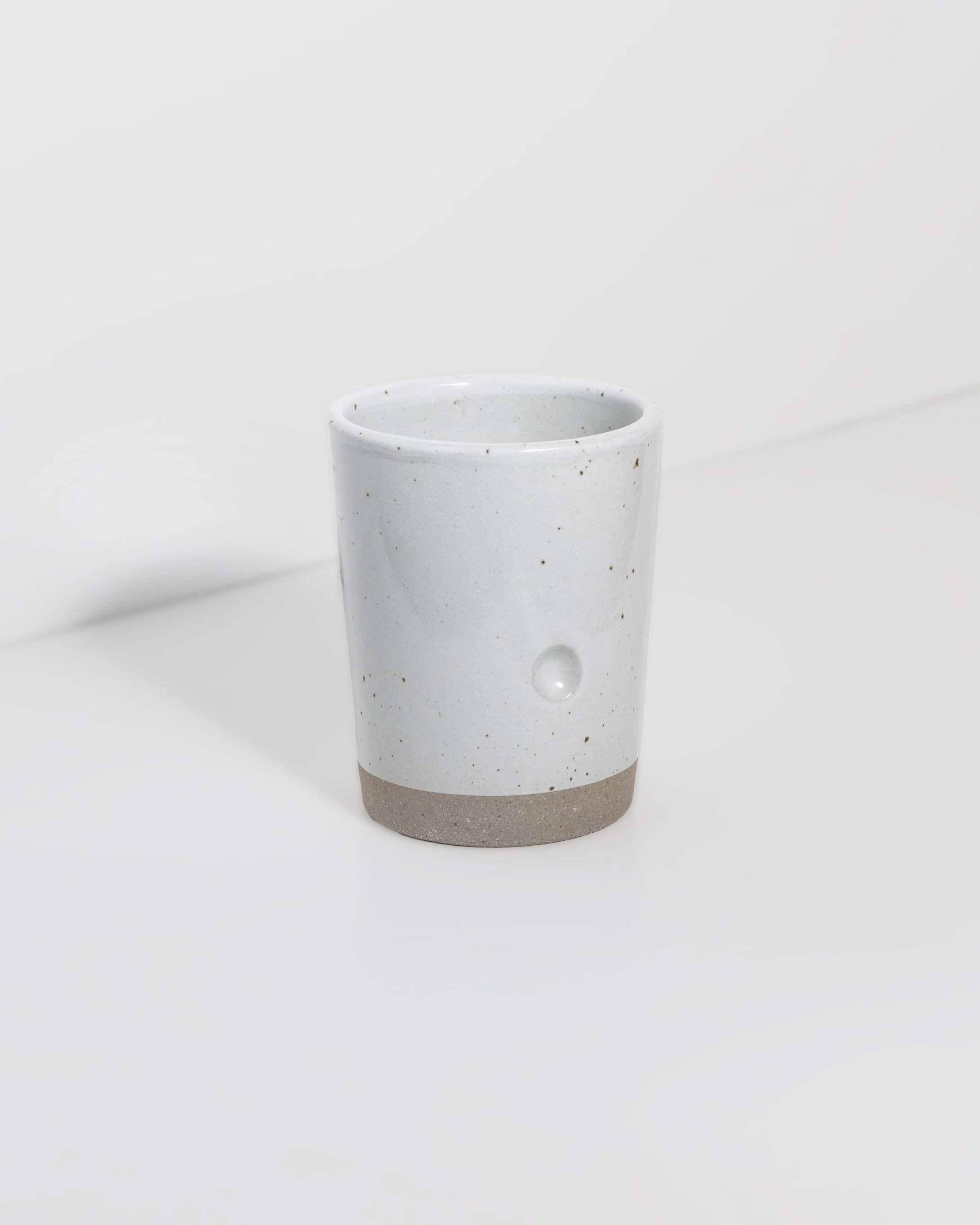 Maier-Ceramics-Dimple-Cup-speckle-white-1.jpg