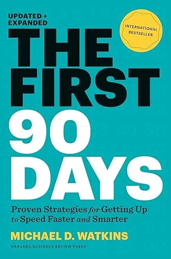 Book cover of 'The First 90 Days' by Michael D. Watkins with a teal background and bold black and white text, labeled as an international bestseller.