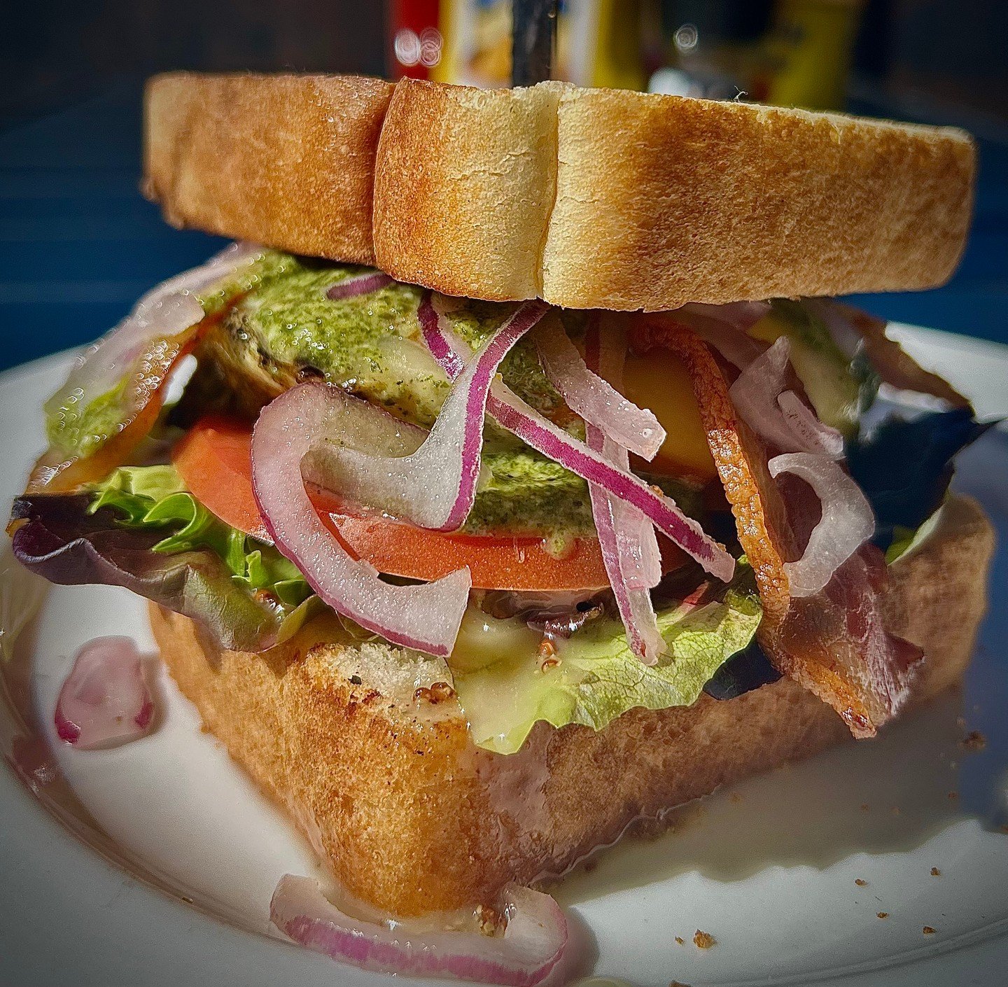 **Crow's Nest Weekly Special** 
Pesto Chicken Club 🥪 Pesto-marinated grilled chicken breast, bacon, Swiss &amp; Gouda cheese, red onions, tomato, and mixed greens tossed in bacon cider vinaigrette dressing on Texas toast. Comes with a side.

Availab
