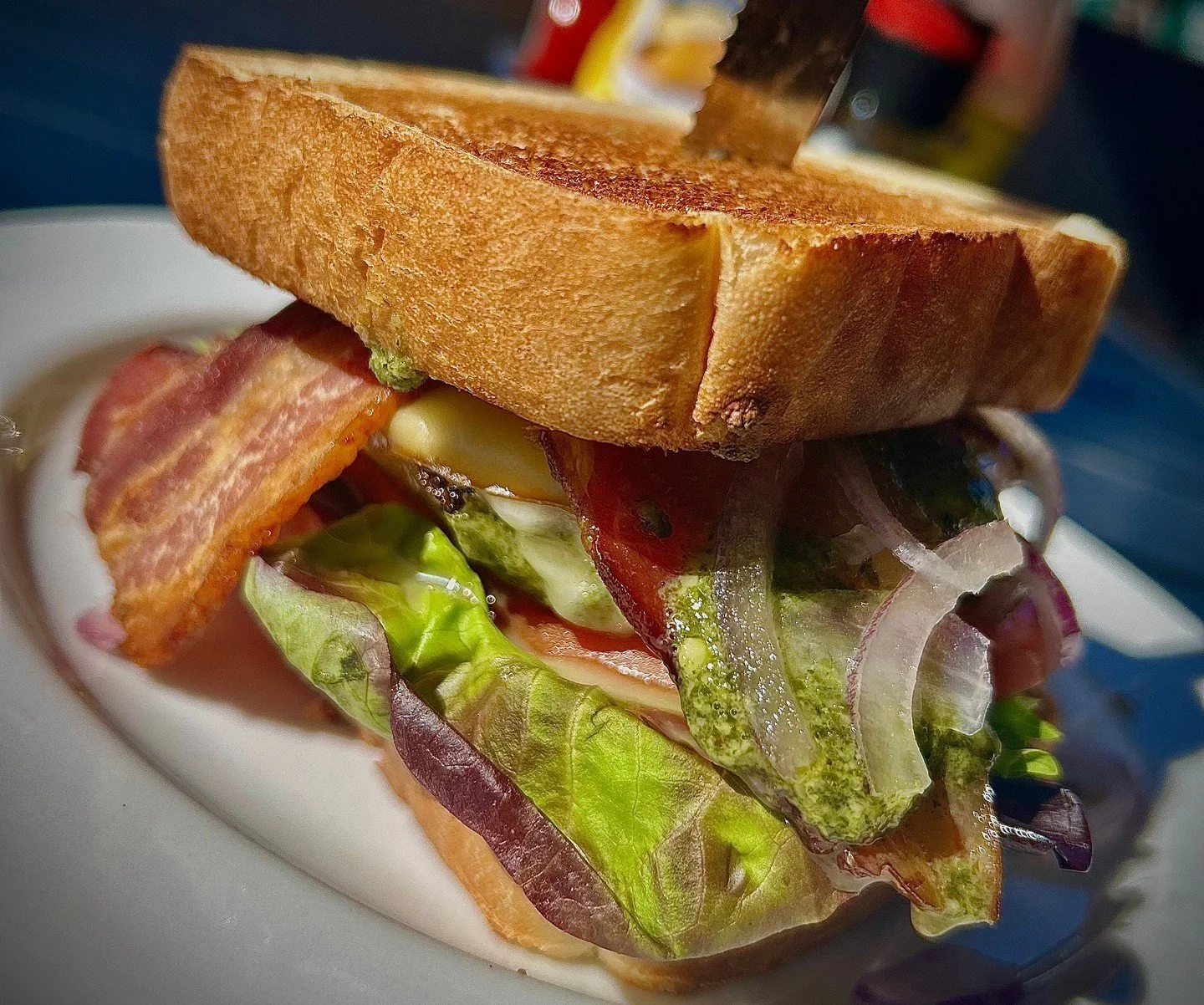 **Crow's Nest Weekly Special** 
Pesto Chicken Club 🥪 Pesto-marinated grilled chicken breast, bacon, Swiss &amp; Gouda cheese, red onions, tomato, and mixed greens tossed in bacon cider vinaigrette dressing on Texas toast. Comes with a side.

Availab