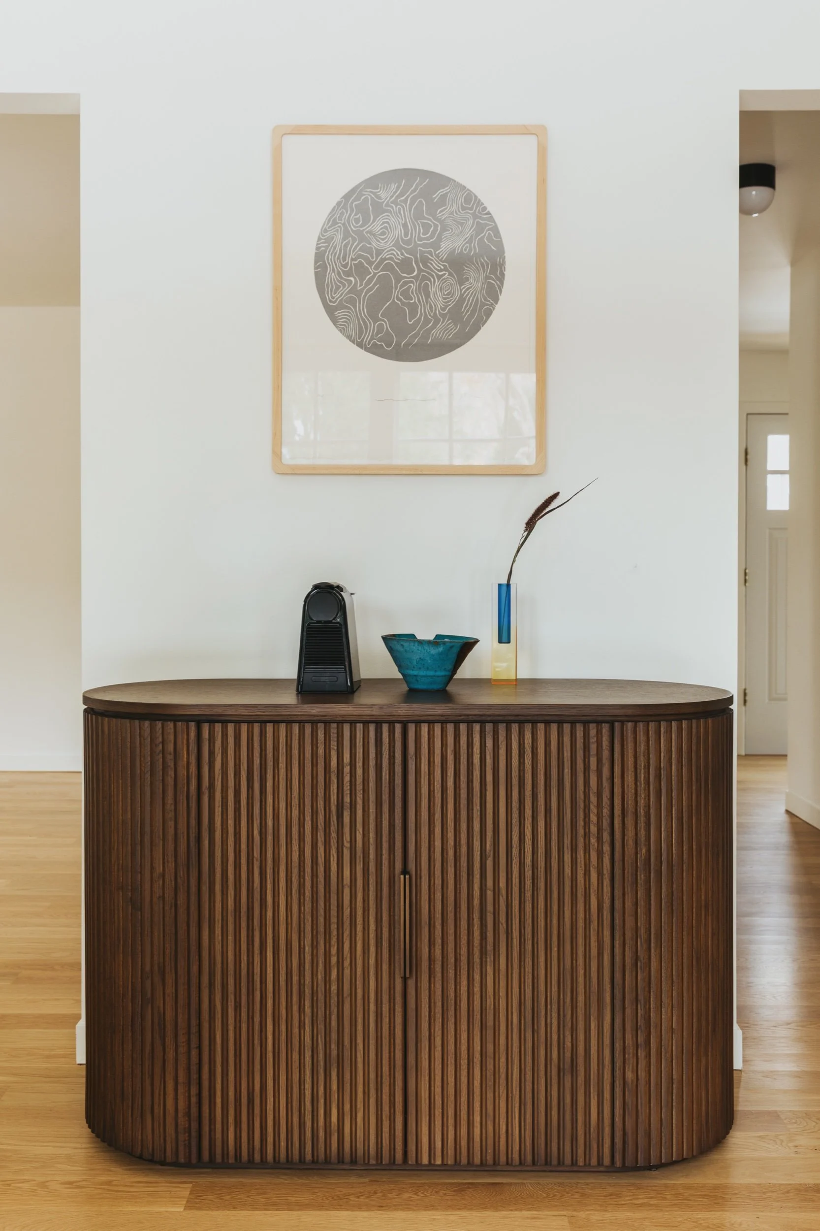 Fluted walnut credenza