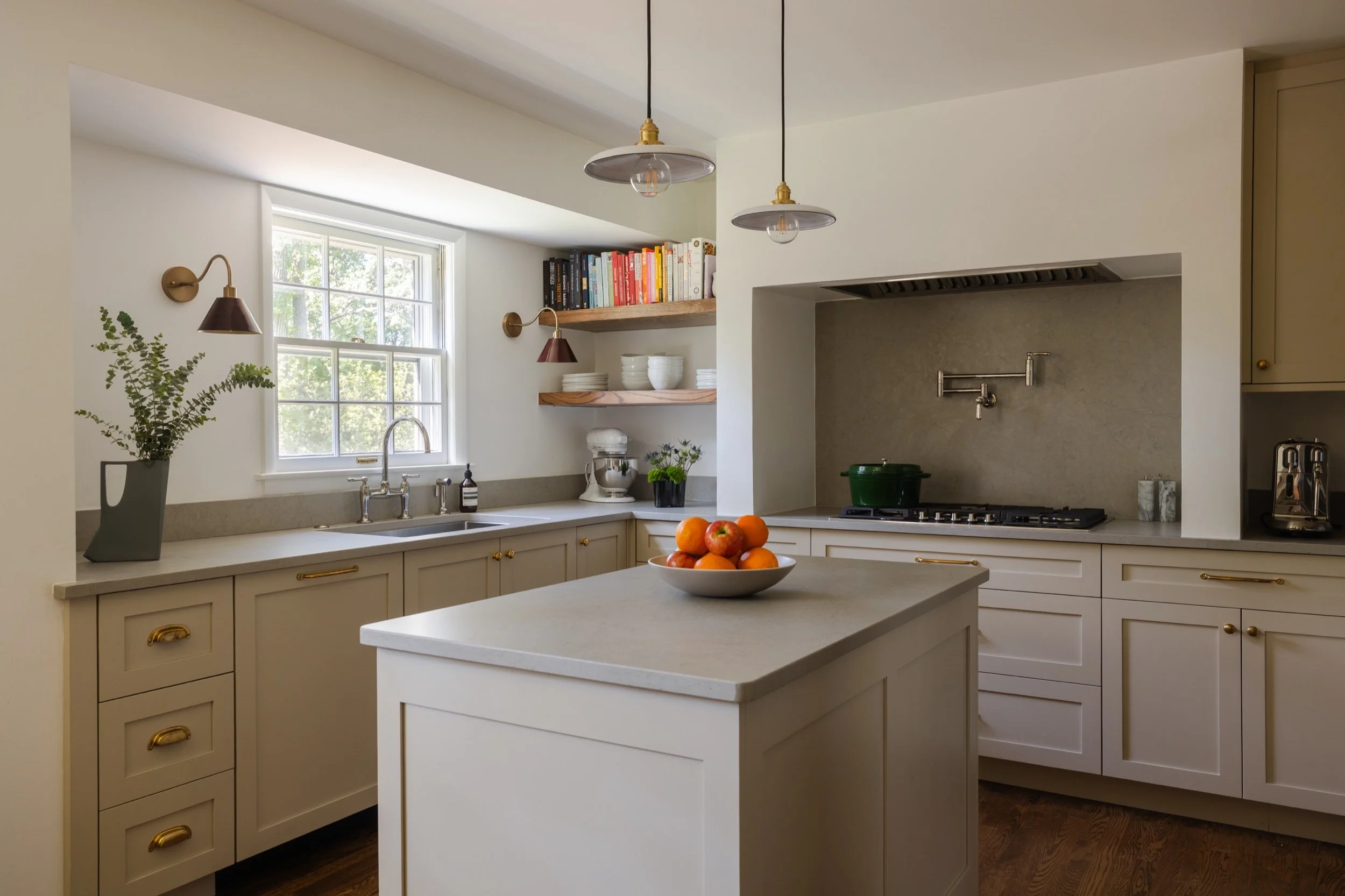 Kitchen with brass pendants and open shelving