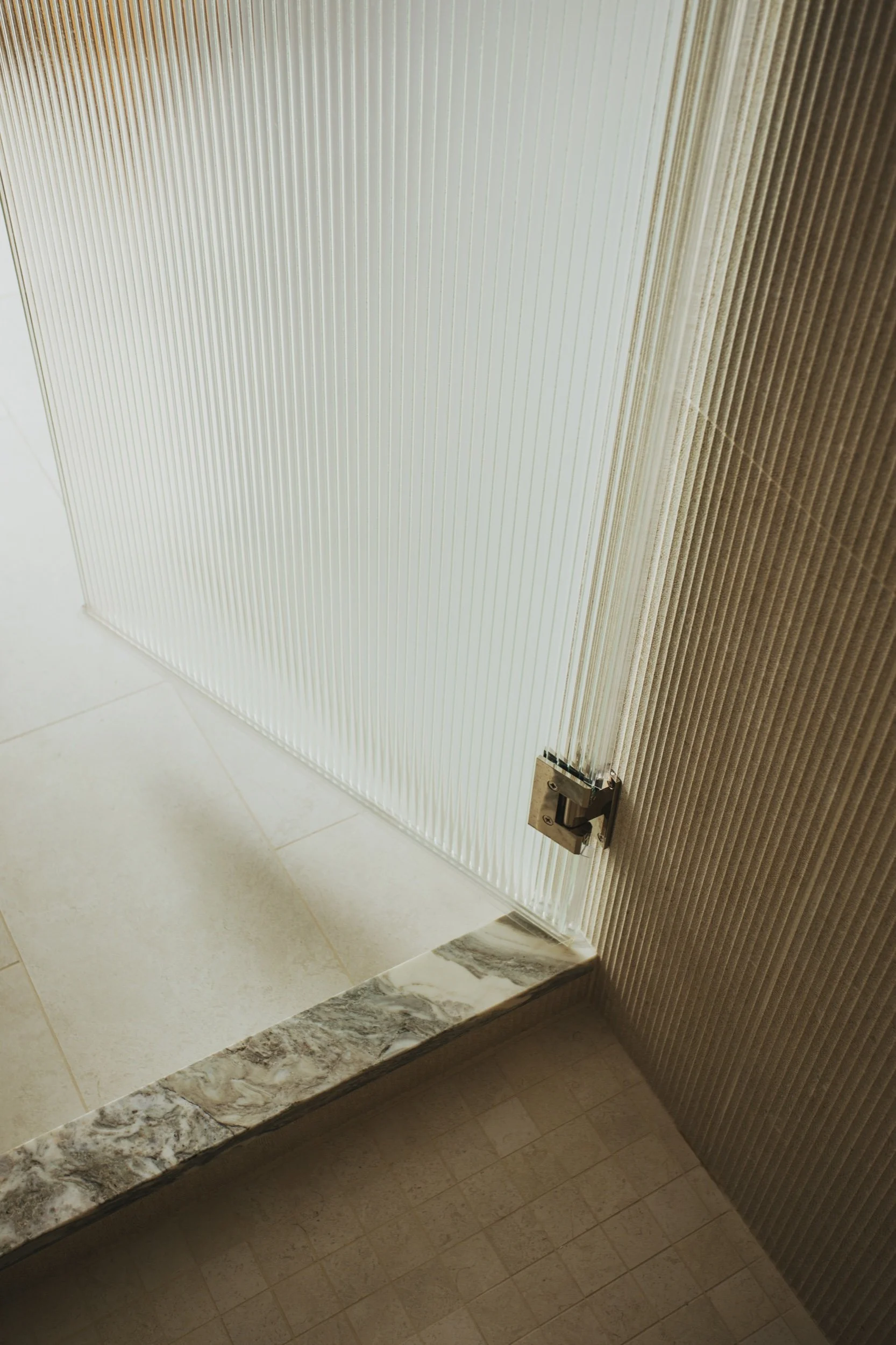 Fluted glass shower screen