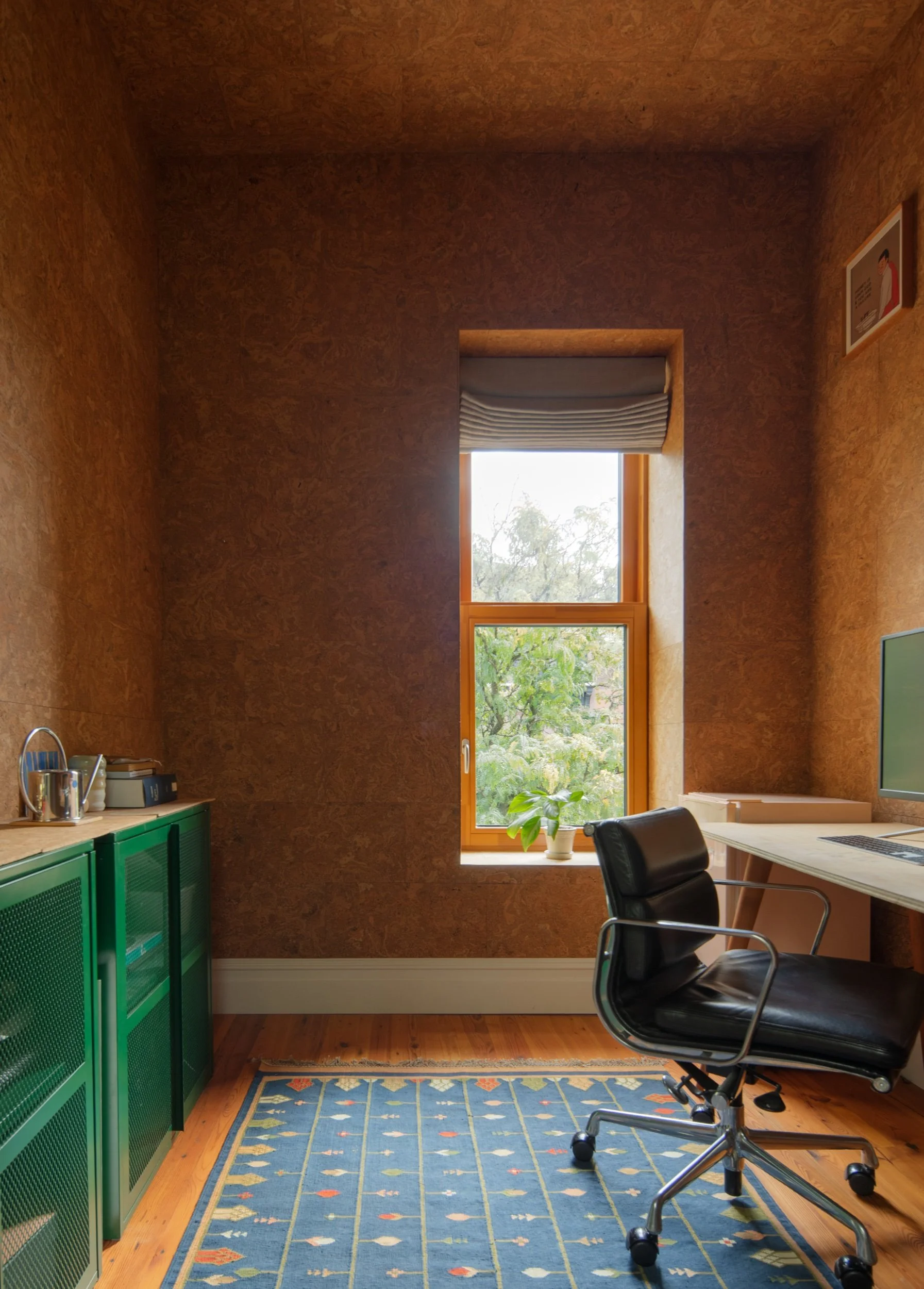 Office with green cabinets