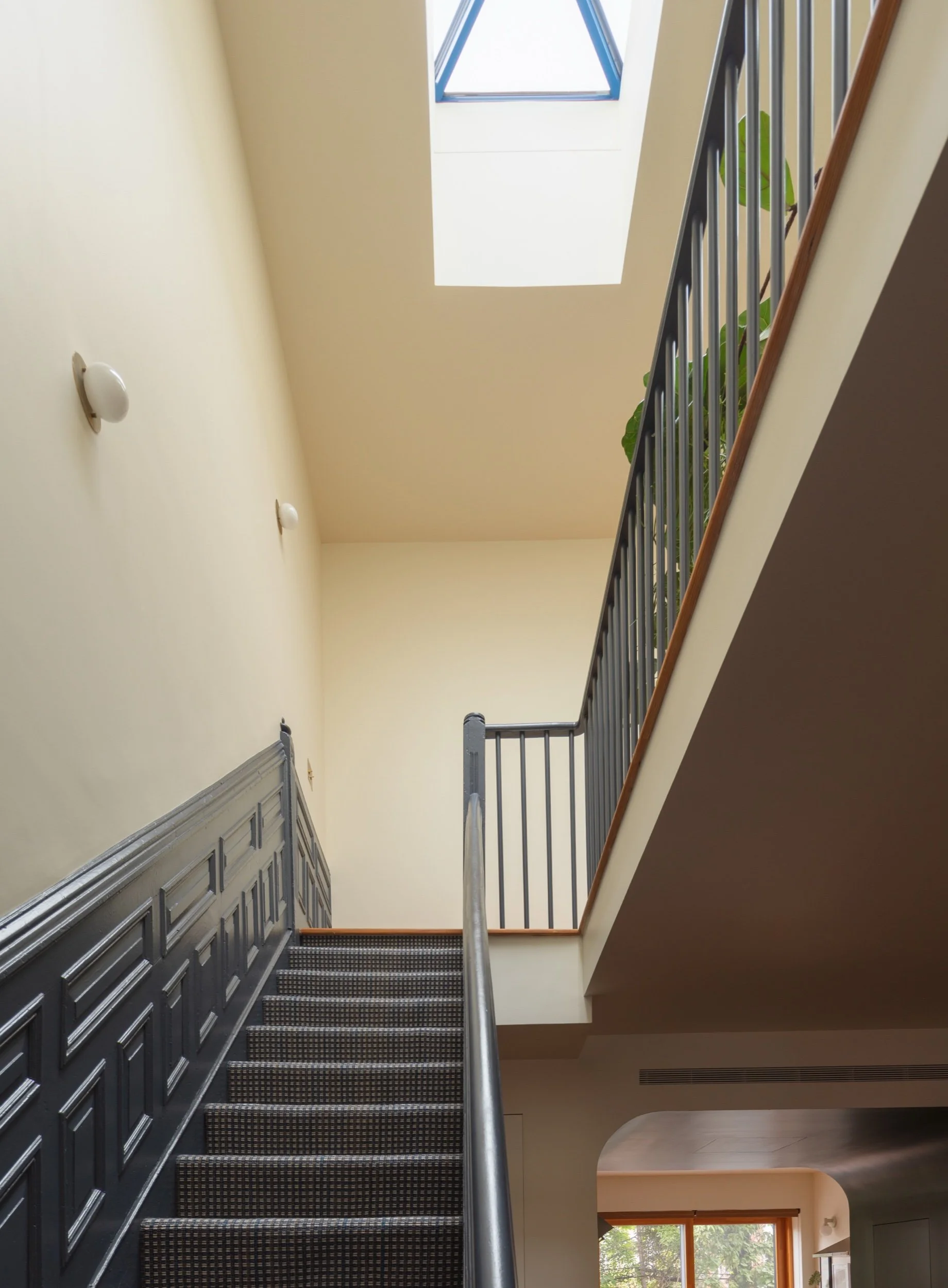 Stair rising to the skylight, Jefferson Townhouse