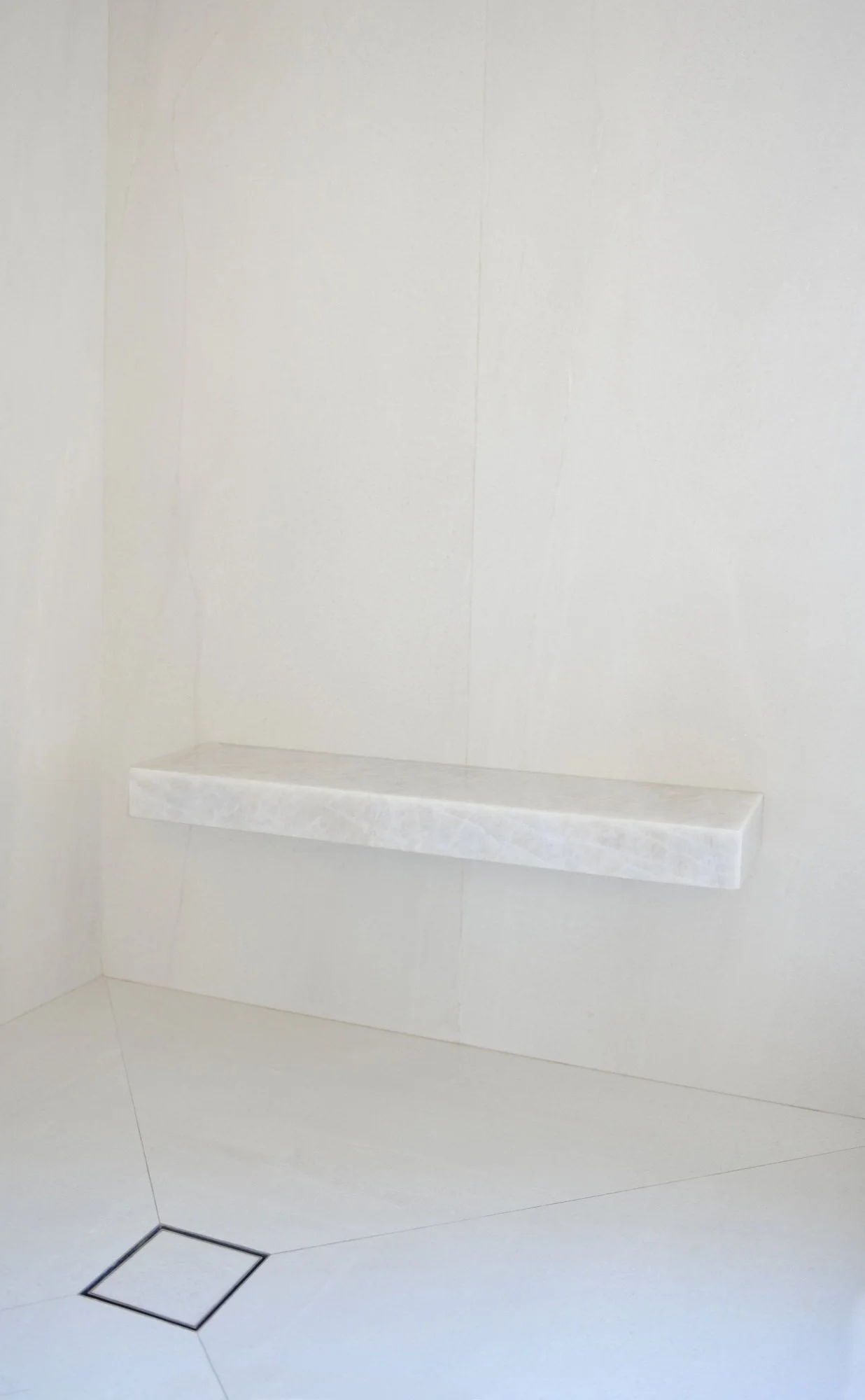 Floating shower bench