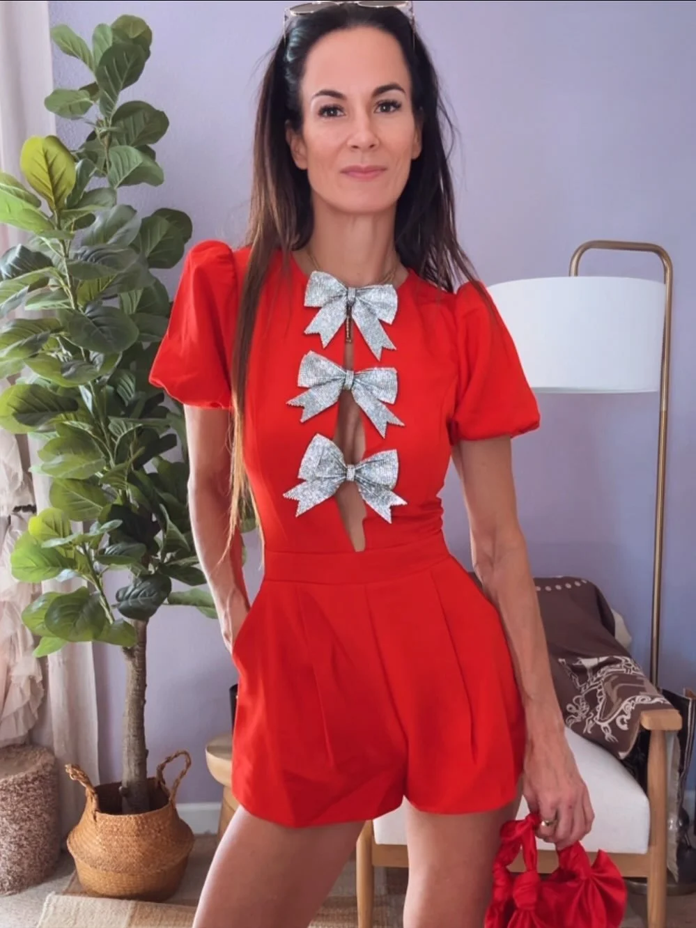 All tied up and ready for the holidays 🎁✨ This bow-topped romper from the new VICI holiday drop might just be my favorite look yet! Festive, fun, and made to sparkle. Use my code NICOLEC35 and comment HOLIDAY for links &mdash; because these statemen