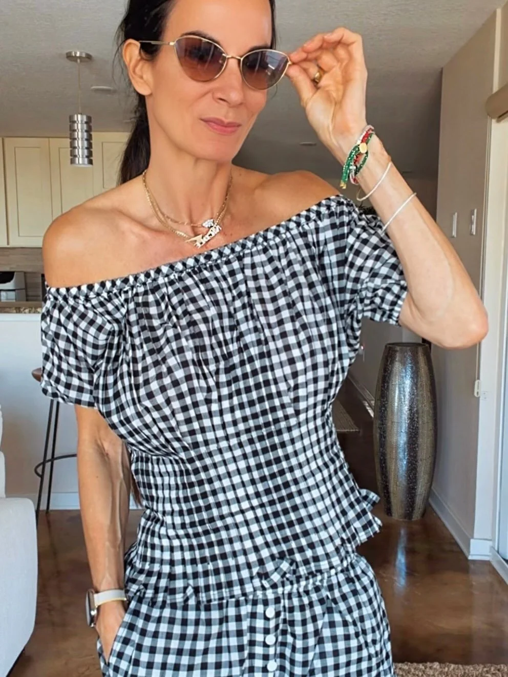 Gingham for spring break? Say less. 🖤

This little set is giving European caf&eacute; meets beach weekend, and I am not mad about it. The off-shoulder top, the comfy smocked waist, the playful little shorts&hellip; it&rsquo;s one of those outfits th