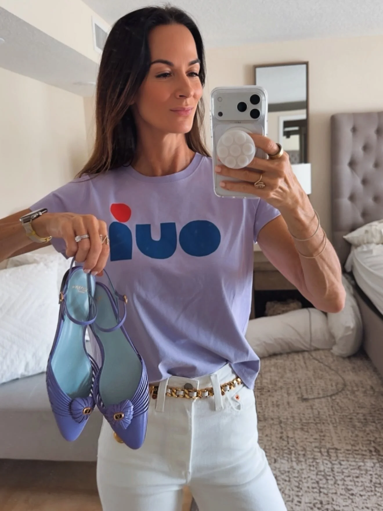 Feeling lucky in purple 💜🀄️

Headed to play Mahjong, where the tiles are unpredictable&mdash;but the outfit is always a winning hand. 😉 Lavender tee, crisp white denim, a little gold and the sweetest purple Valentino flats&hellip;because obviously