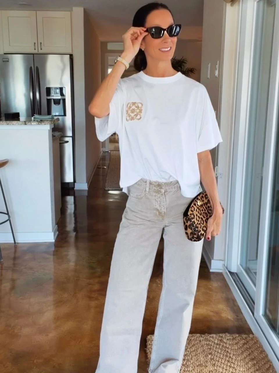 My version of &ldquo;just jeans and a tee&rdquo; has a few accessories attached. 🐆🤍

A little leopard, a statement flat and sunglasses that suggest I have absolutely no errands to run. 😂

This is the outfit formula I&rsquo;ll always come back to: 