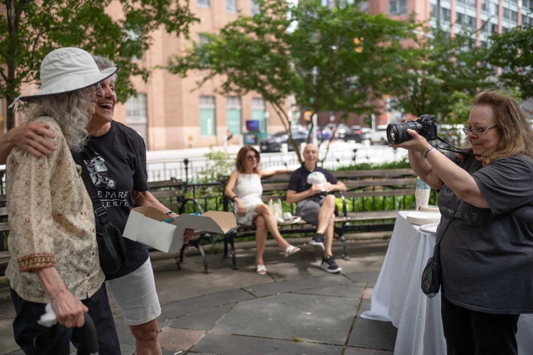 Linda Buongermino photographing Madeline (Duane Patisserie owner) with long time friend resident artist. 