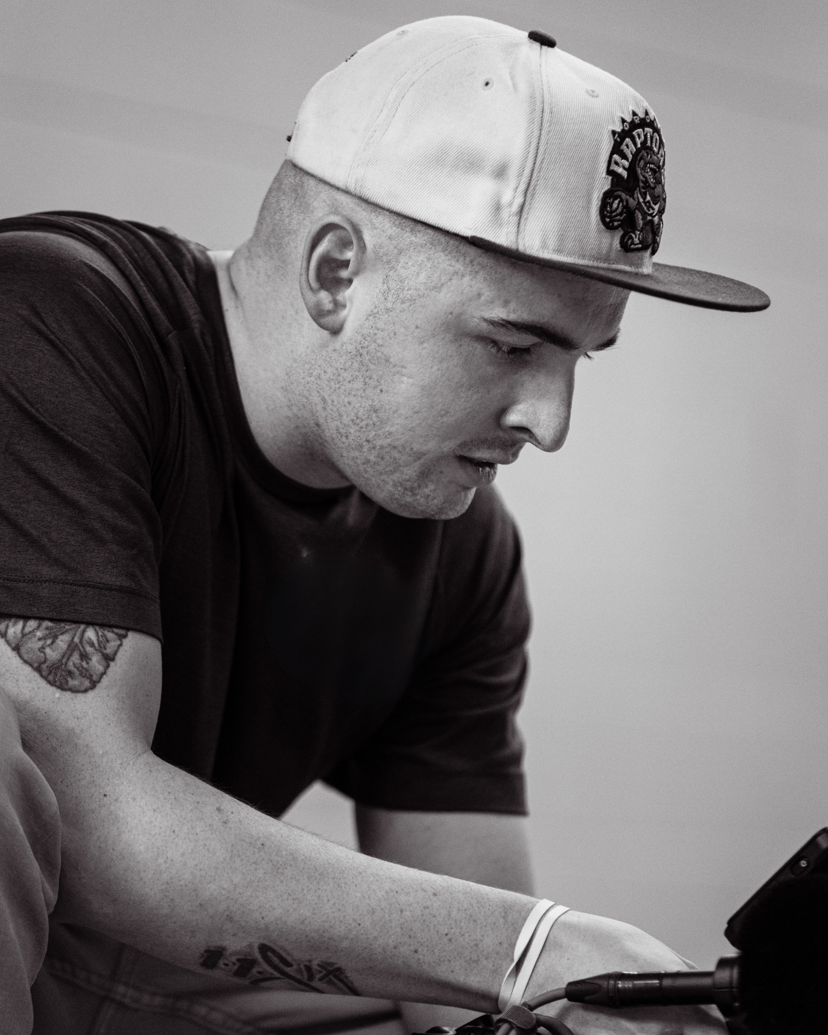 Gavin Gill, owner of Gavin (Bison) Media, focused on capturing a high quality shot with professional camera for a Client.